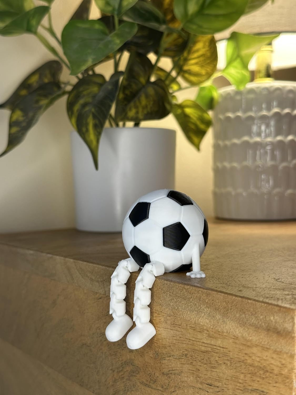 Soccer Ball Buddy Figurine with Articulated Legs, Decorative Sports Collectible, Desktop Shelf Decor, White and Black, Unique Gift for Soccer Enthusiasts