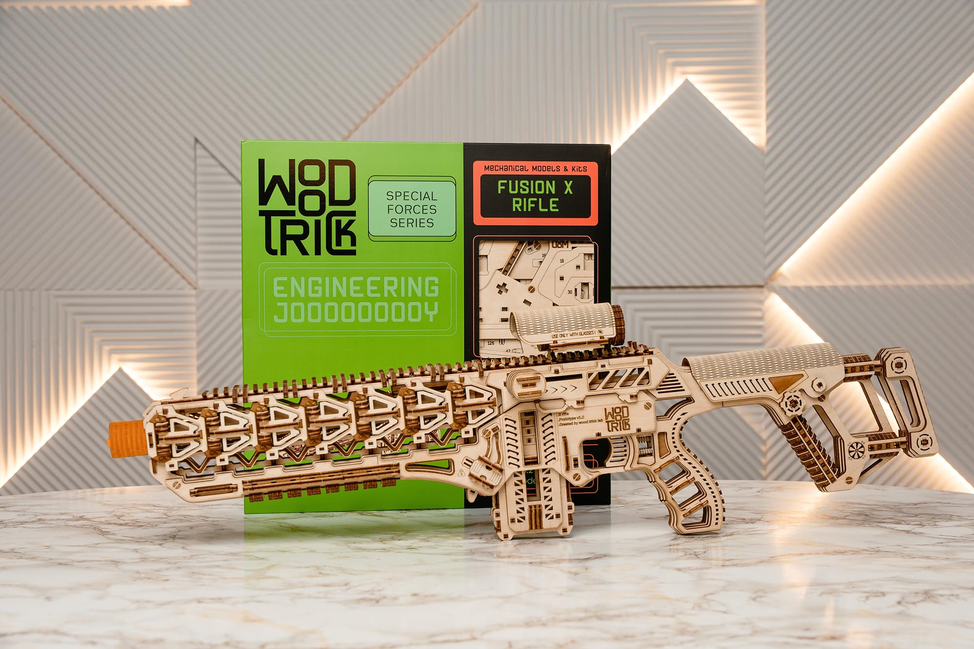 Wood Trick Fusion X - Puzzle 3D in legno per adulti - con testa telescopica, fusibile, mirino e clip per 9 colpi - Costruzione dettagliata - 58 x 20 cm - Kit modello per adulti da costruire - 14+