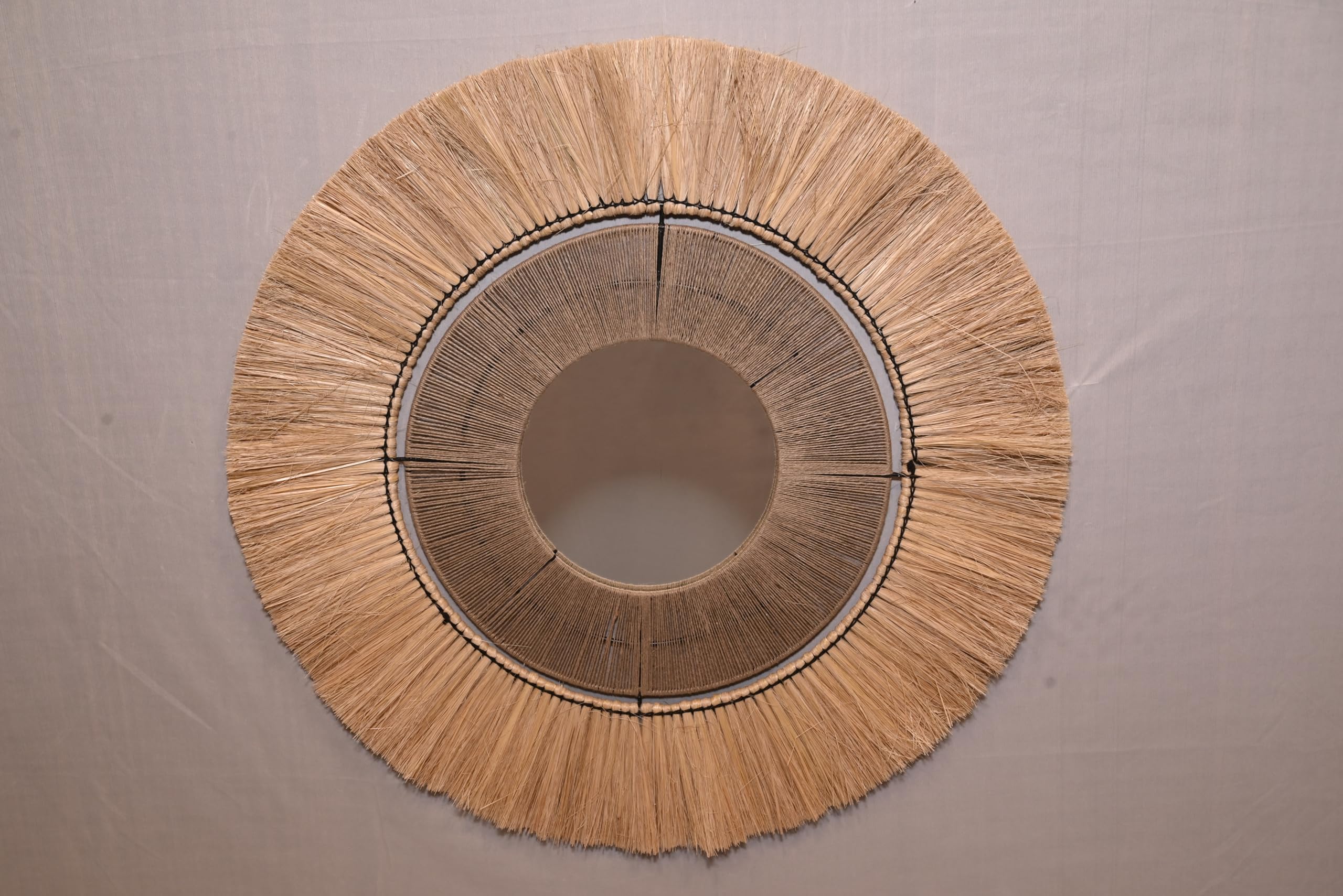 Miroir mural rond en bambou pour agrandir une pièce sombre et étroite