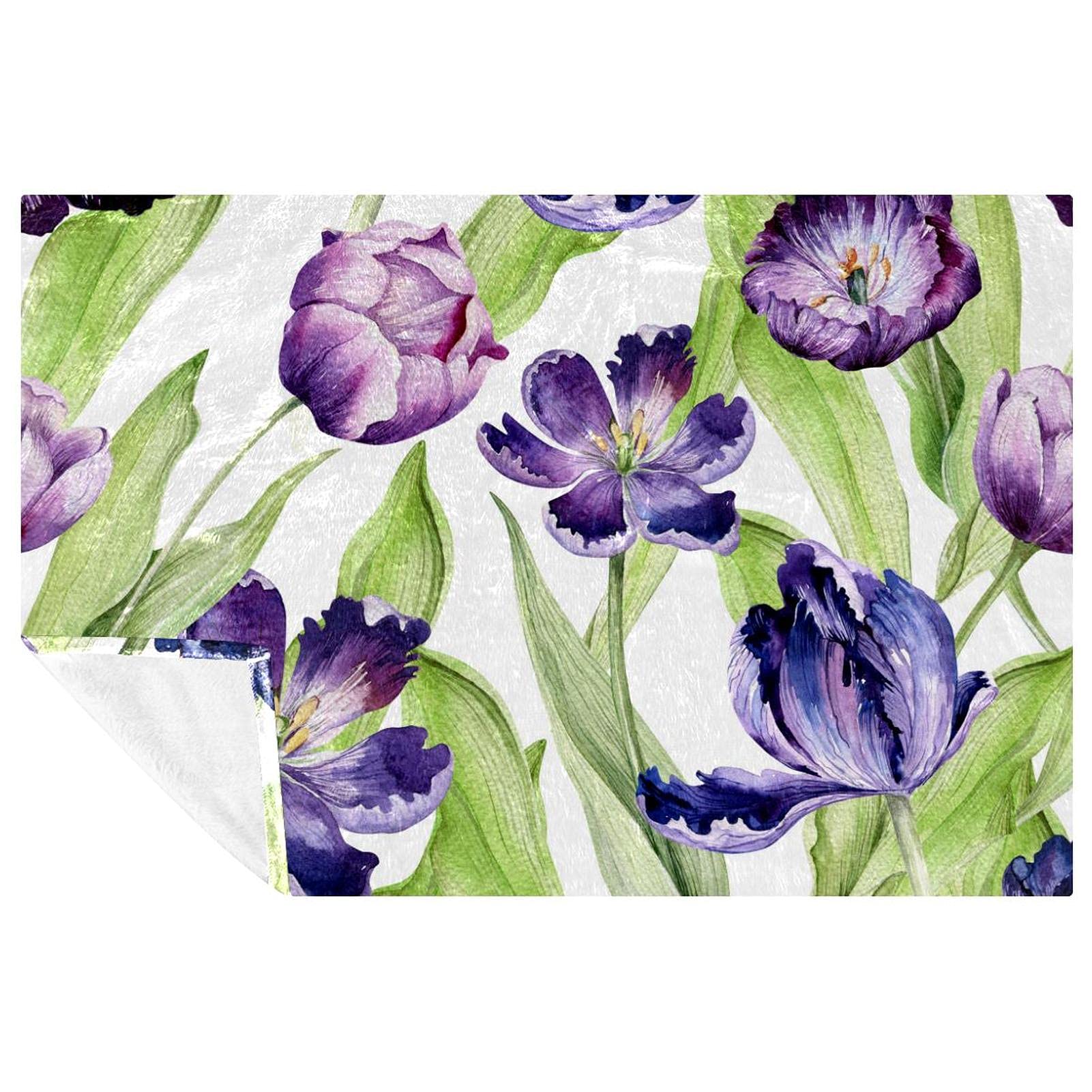 Couverture chaude tulipes pour stopper le froid sur le canapé