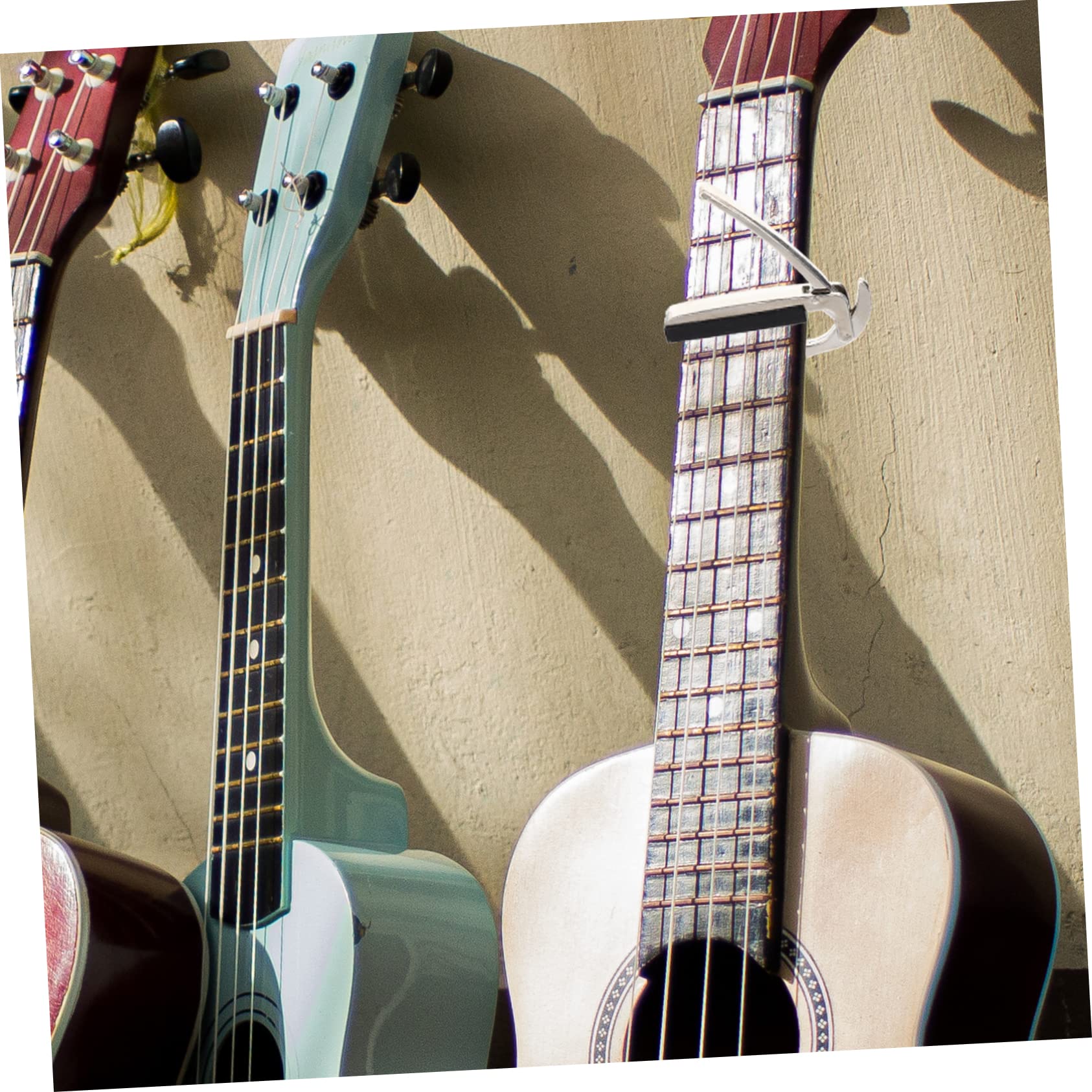 Kisangel 4 Piezas Capo de Guitarra Metálico y Duradero Sintonización Accesorio Portátil y Práctico Acústicas y Eléctricas de Ajustar y Reposicionar Músicos y Aficionados