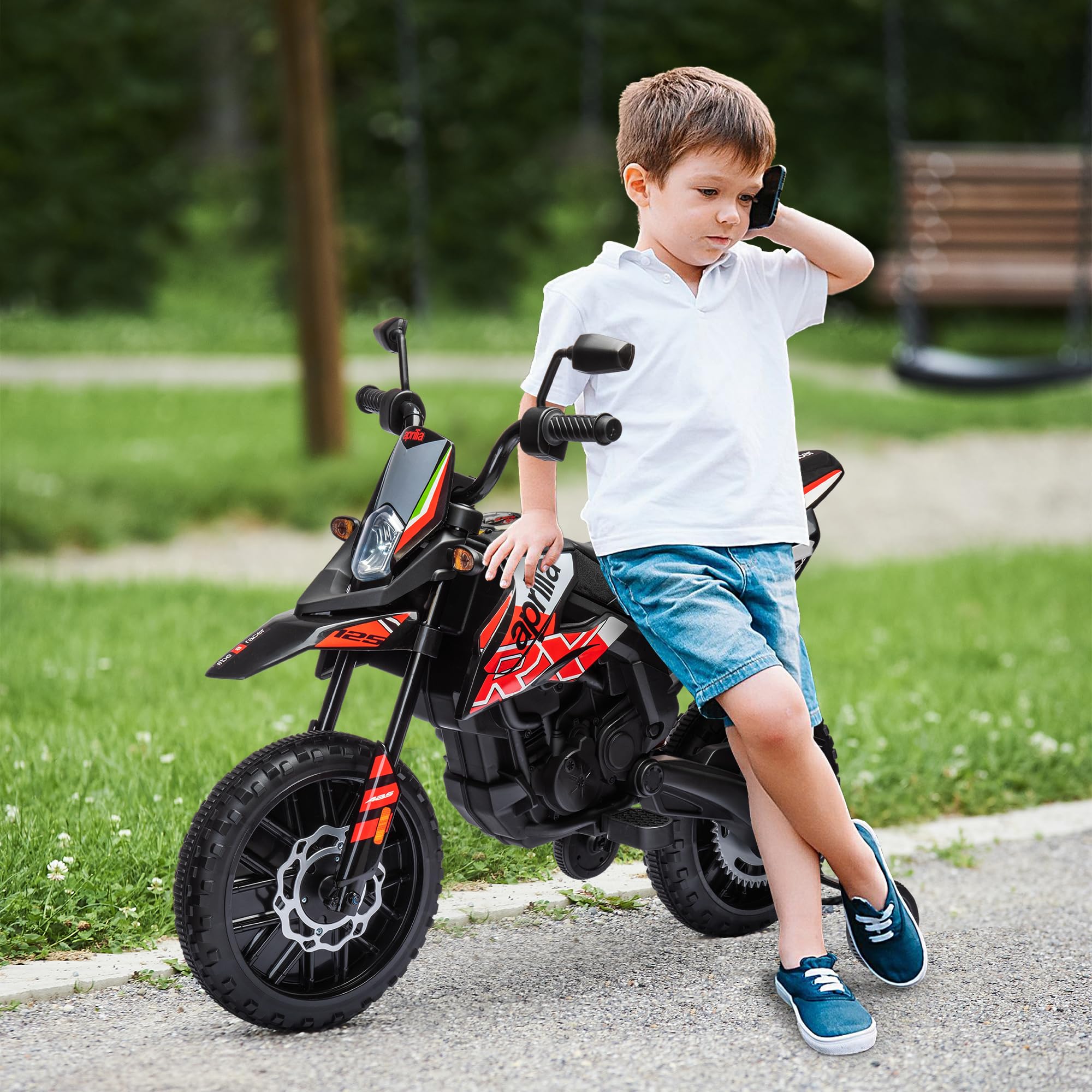AIYAPLAY Moto électrique Enfants Moto Cross pour Enfant sous Licence Aprilia avec 2 Moteurs 12V, Vitesse Max. 6 km/h, Roues d'entraînement, Suspension à Ressort, lumière LED, Musique, USB - Rouge