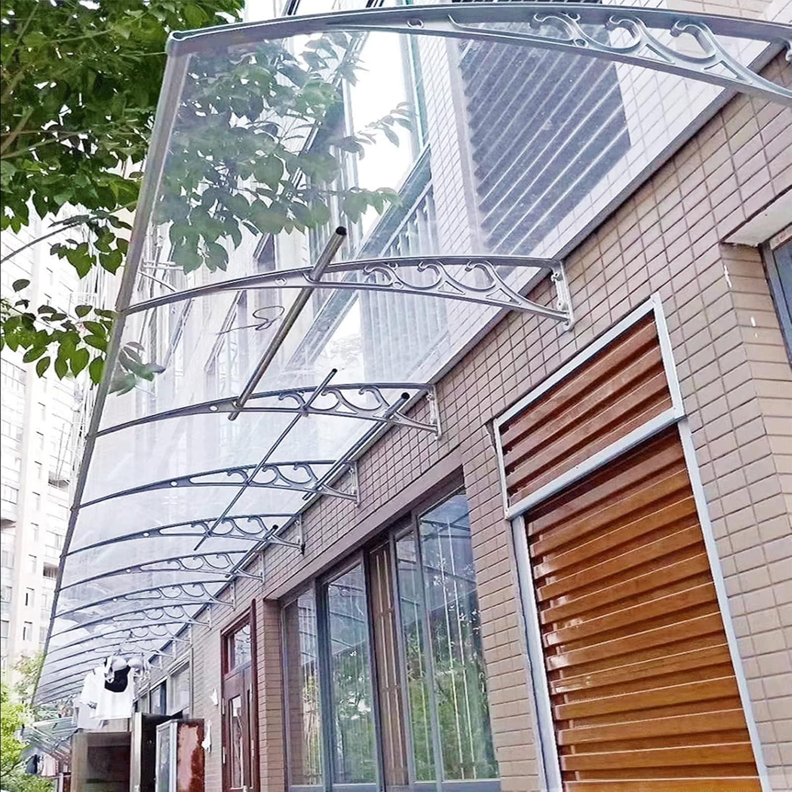 Auvent de porte anti-intempéries avec polycarbonate incurvé
