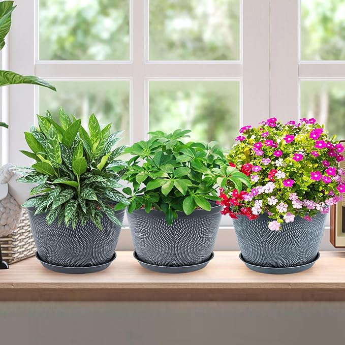 Overall, the Quarut 10 Inch Flower Pots Planters are a convenient and attractive option for those looking to add some greenery to their living spaces. With their drainage hole and tray, these planters help maintain the health of your plants by preventing waterlogging. Their modern design and durable construction make them a great choice for both indoor and outdoor use, providing a stylish home for your favorite plants. Description by ChatGPT.