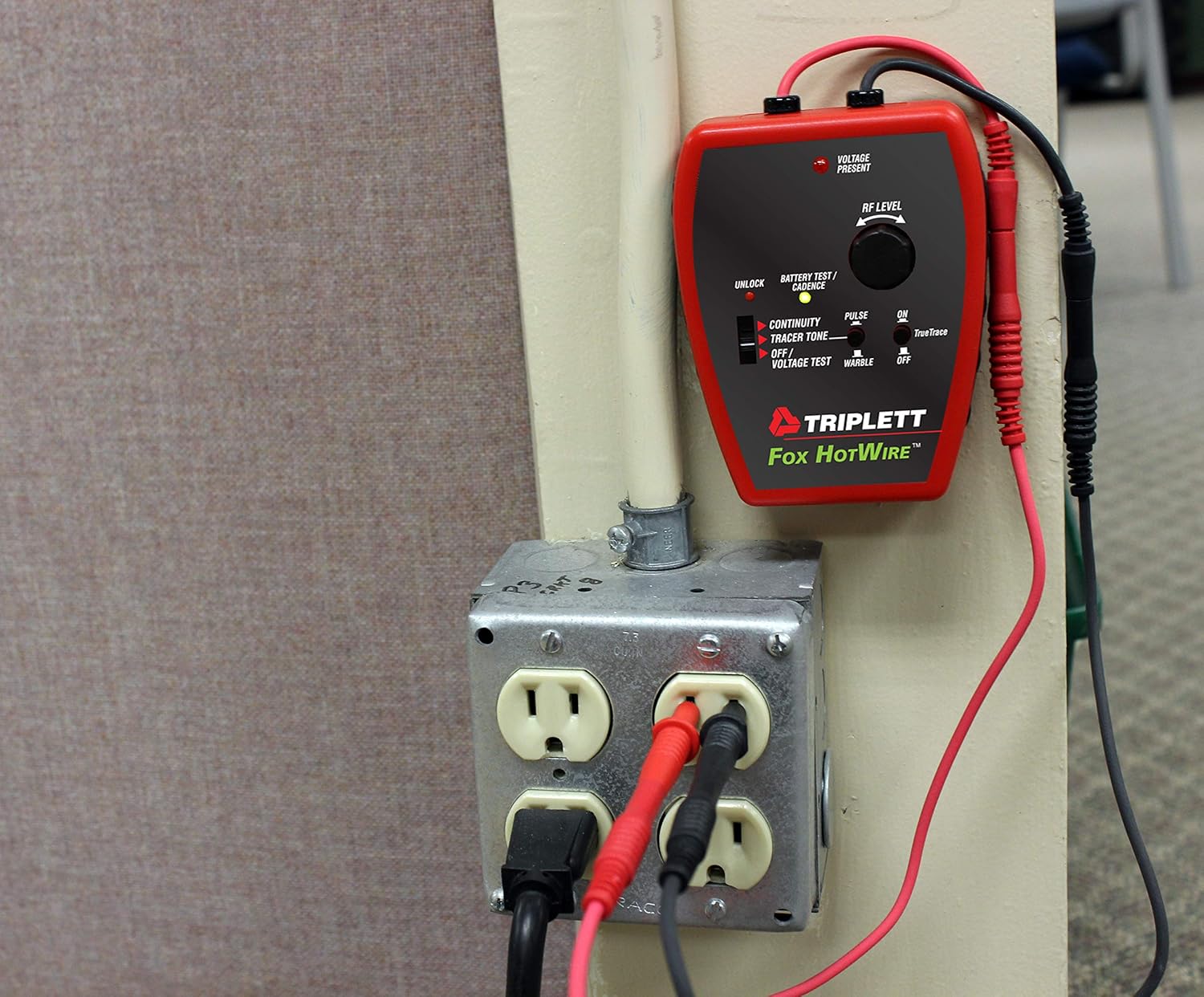 Triplett Fox HotWire connected to a wall outlet for tracing