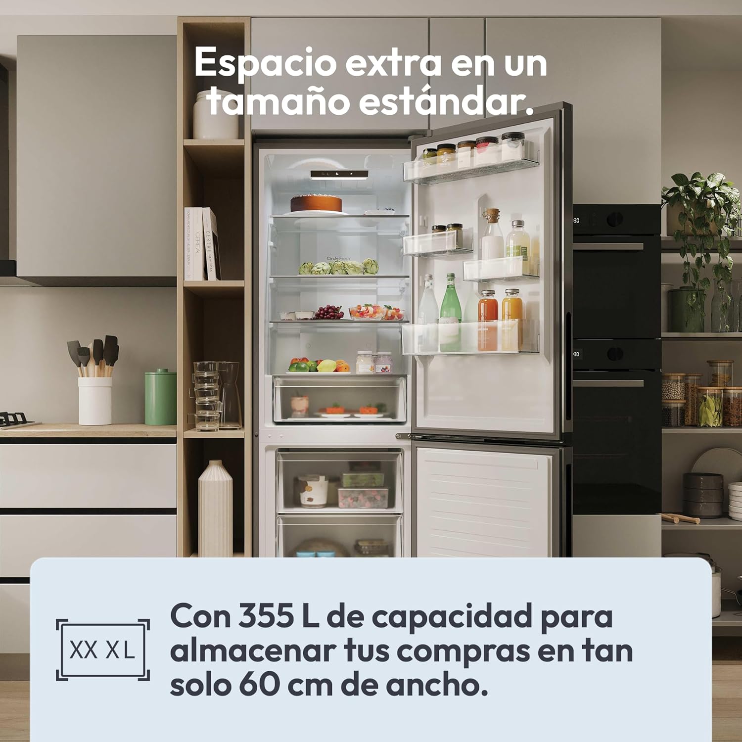 Interior of the Candy Fresco 300 refrigerator showing ample storage space with the text 'XXL' and '355L' highlighting its large capacity.