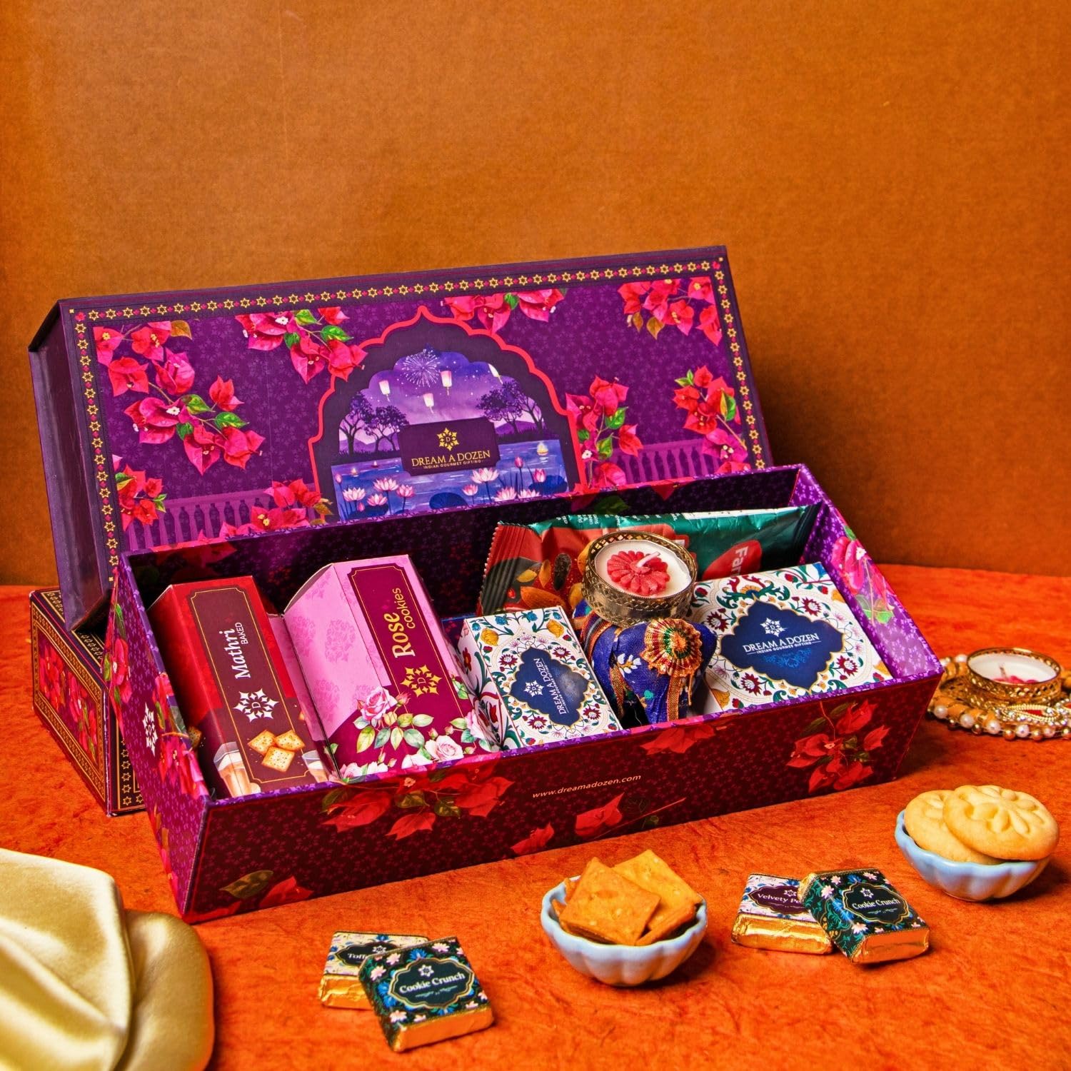 Dream a Dozen Floral Fantasia Eggless Gift Hamper | Premium Diwali Gift Box with Merchandise, Eatables, Sweets and Savoury | Rose Cookies, Mathri Crackers, Gourmet Chocolates, Peri Peri Mixed Nuts, Elephant Tealight Holder, Festive Tealight Candles & Greeting Card | Luxury Indian Gift Hamper for Family, Friends, Employees & Clients | Corporate Diwali Gifts & Festive Snack Box-image-31