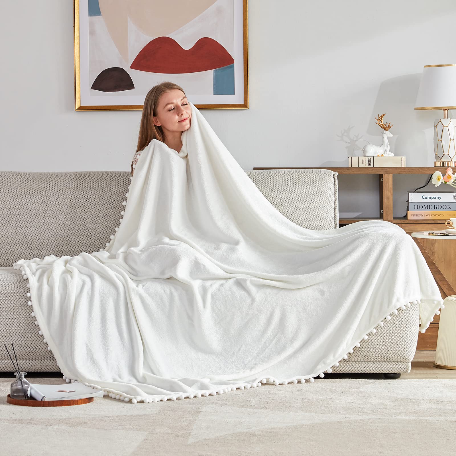 Amazon｜BEAUTEX フリーススローブランケット ポンポンフリンジ付き 