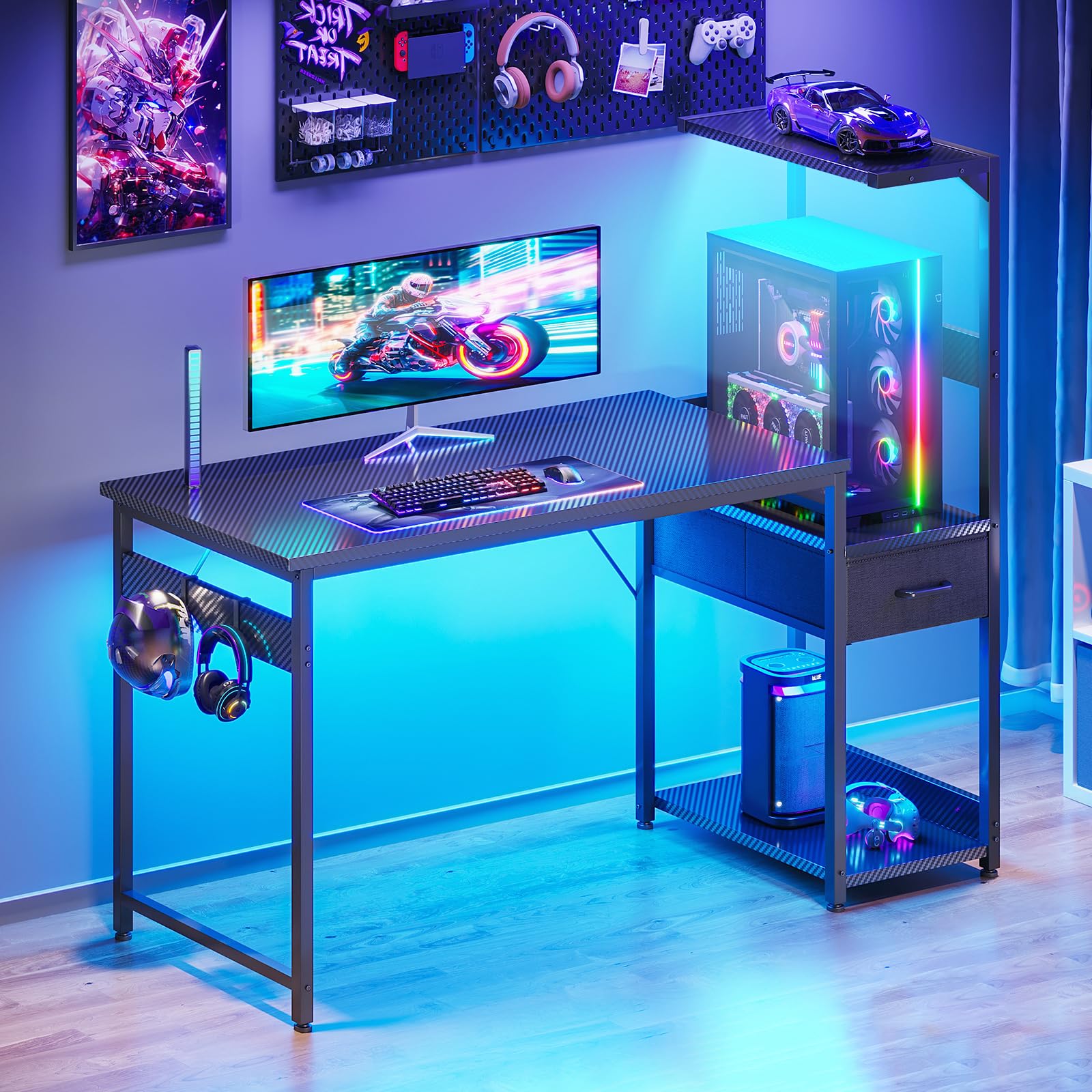 Coleshome Escritorio Gaming con Iluminación LED, 120×48cm Mesa Gaming con Cajones y Estanteria, Mesa Gamer Reversible con Gancho para Cascos, Negro Fibra de Carbono