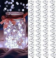 Vista 8 de AIKEI Paquete de 12 luces LED de hadas que funcionan con pilas, guirnaldas de luces impermeables de 7 pies, 20 luces LED de luciérnagas estrelladas