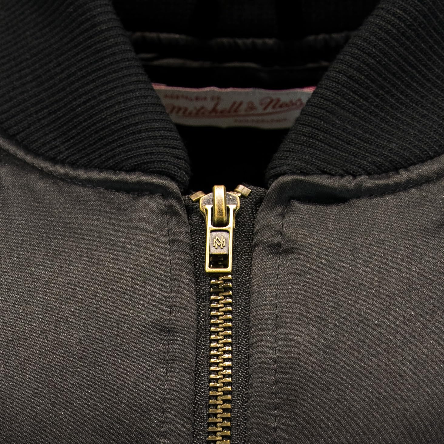 Mitchell & Ness NFL Team Bomber Chaqueta, Negro