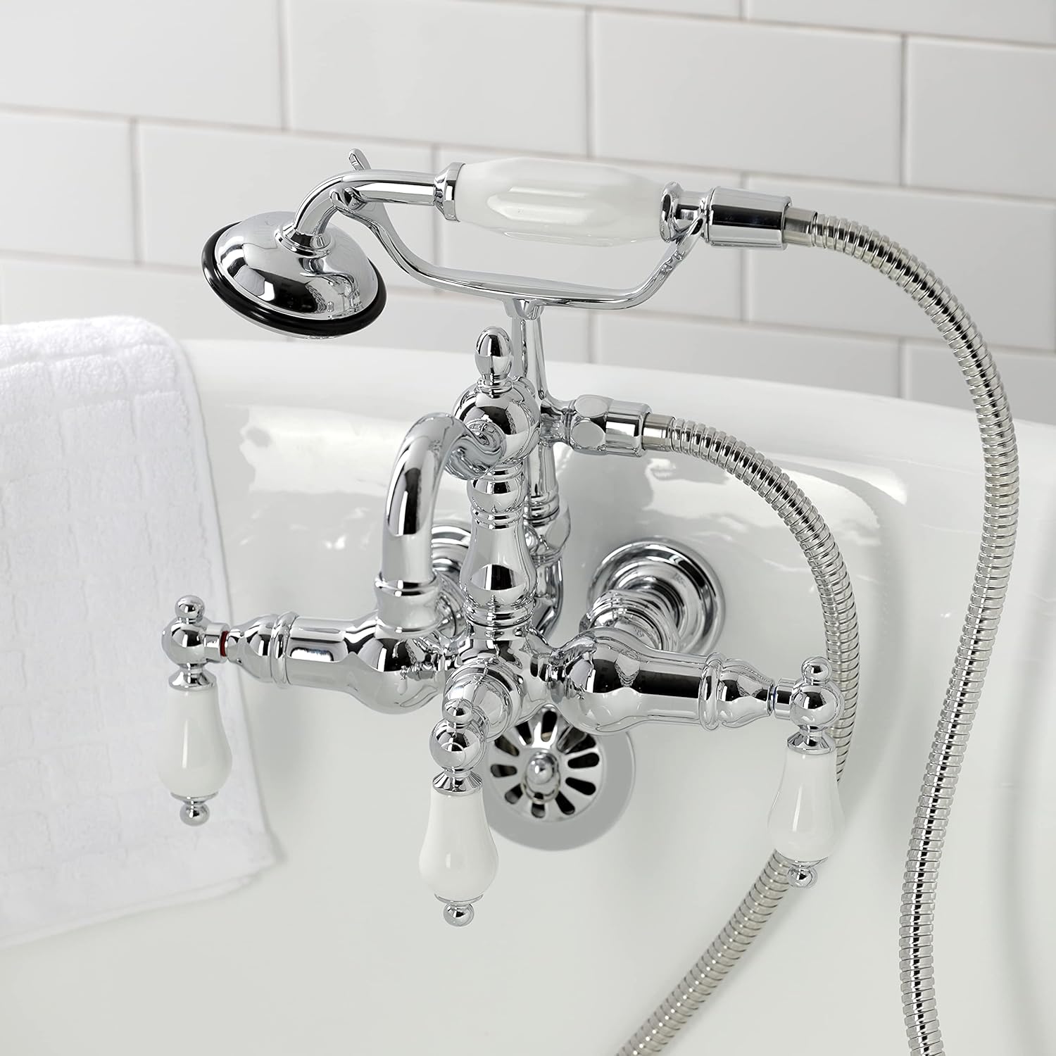 Kingston Brass CA1012T1 Heritage Three-Handle 2-Hole Tub Wall Mount Clawfoot Tub Faucet with Hand Shower in Polished Chrome