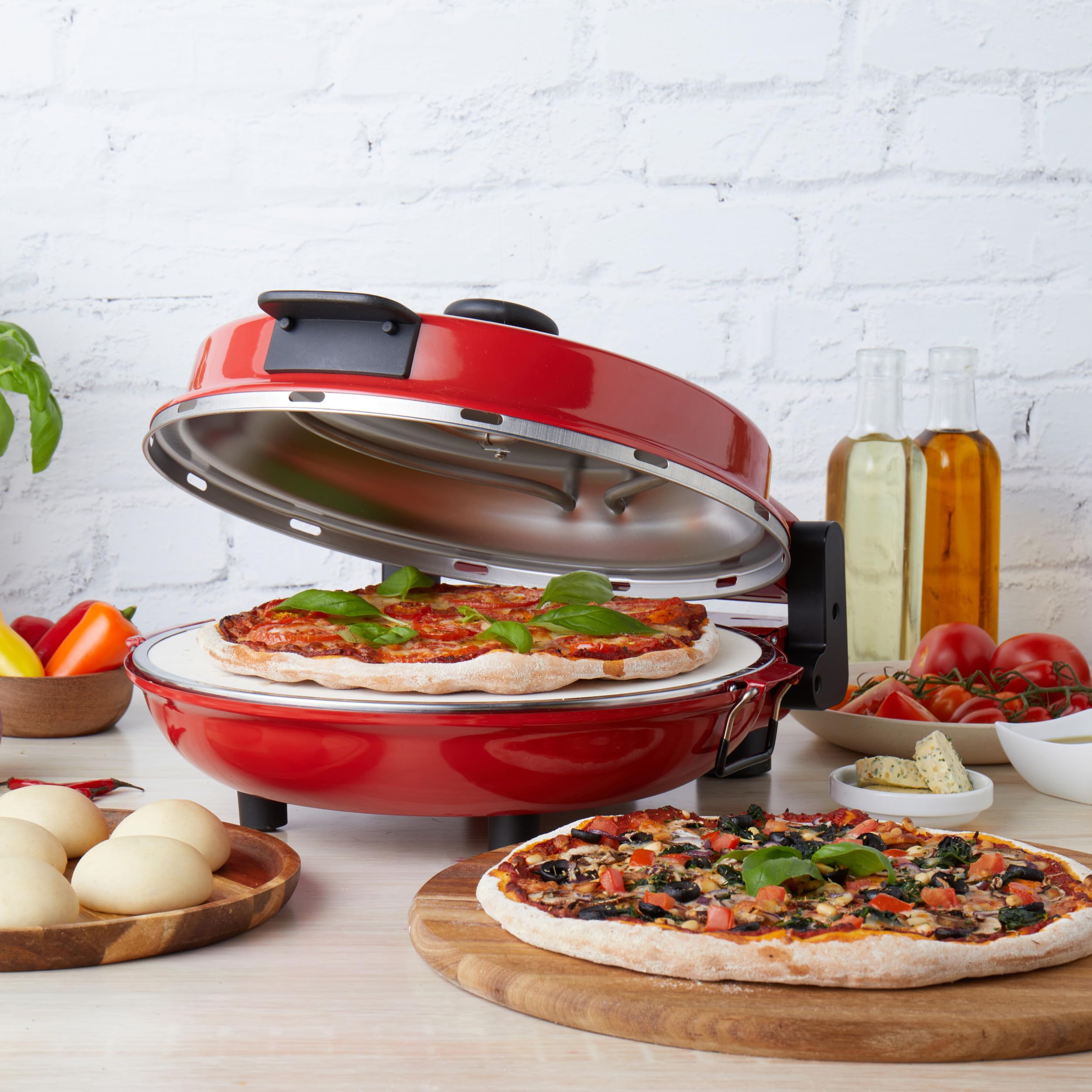 Petra PT5666VDE Horno eléctrico para pizza - interior, 1200 W, 5 niveles de temperatura, precalentamiento rápido, pizzas de 12 pulgadas en 5 minutos, piedra para pizza extraíble, cortador y 2 paletas