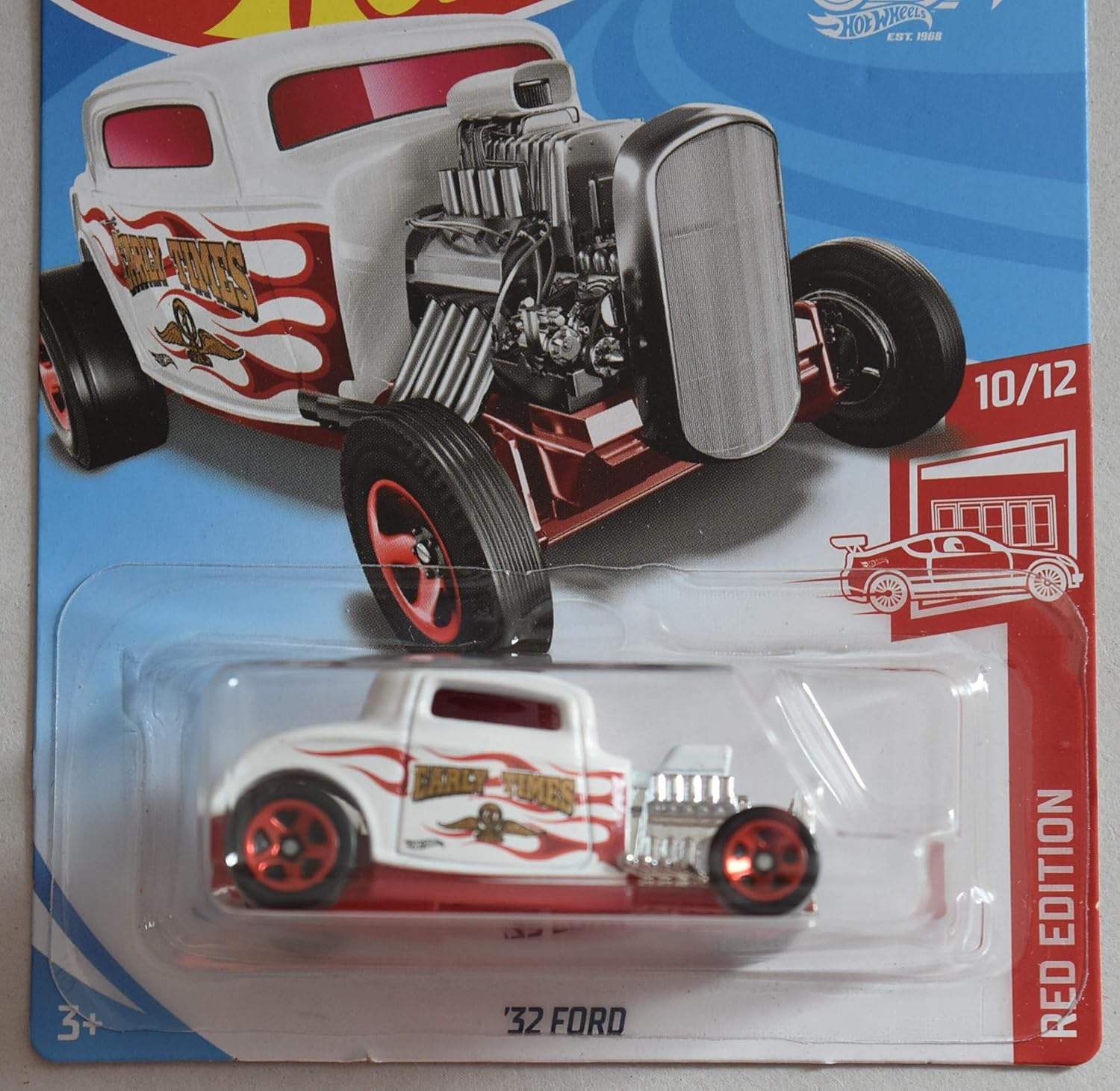 Close-up of the Hot Wheels RED Edition '32 Ford die-cast car, highlighting the red flame decals and red wheel accents.