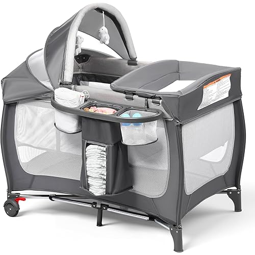 Kinder King 4 in 1 Portable Pack and Play, Baby Playard w/Bassinet, Large Playpen for Infant and Toddler, Newborn Changing Table, Adjustable Canopy, Storage Basket, Travel Bag, Grey