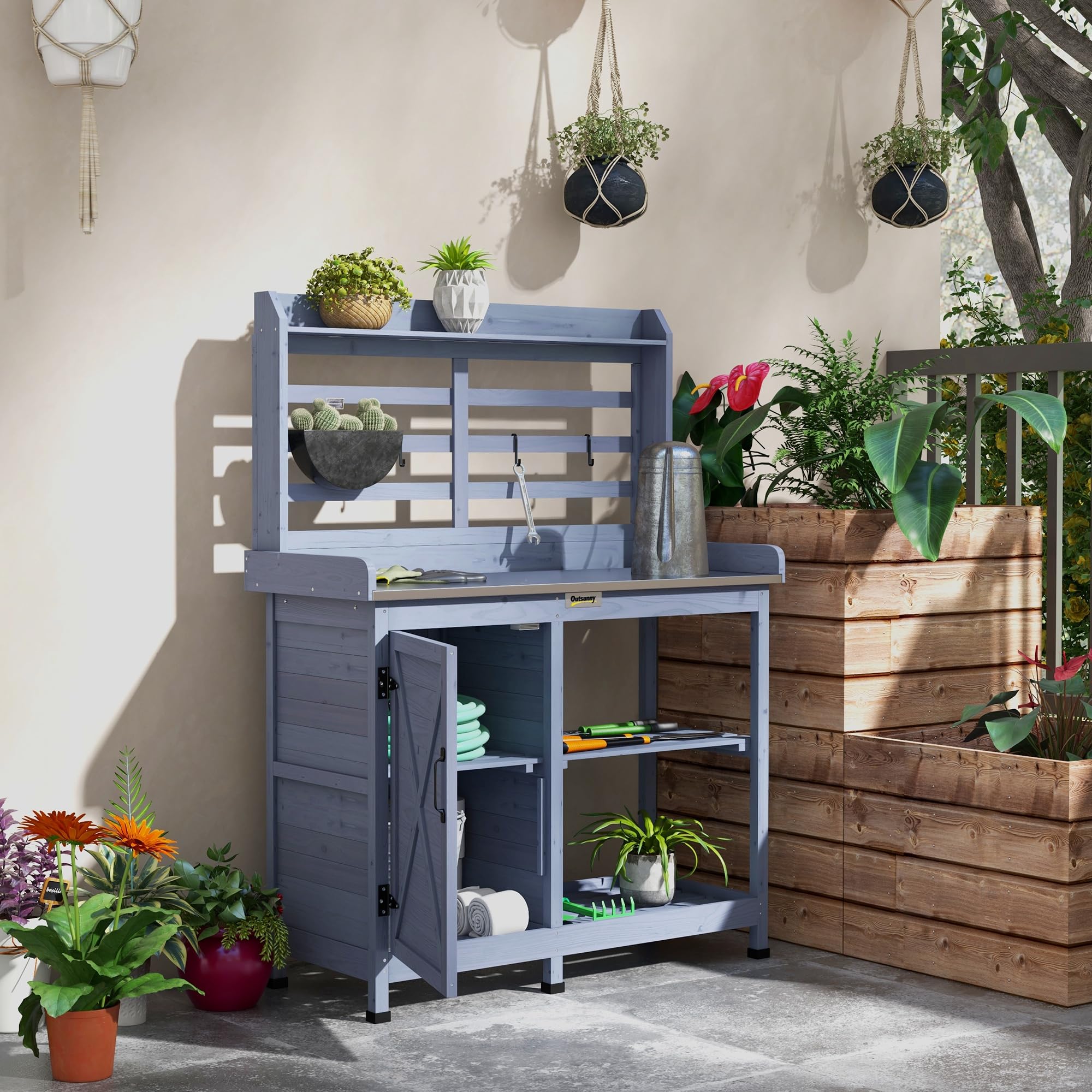Outsunny Pflanztisch aus Holz, Gärtnertisch mit Schrank, Blumentisch mit Arbeitsplatte, Holzpflanztisch mit 2 Ablagen, 4 Haken für Garten, Grau, 112 x 47 x 146cm