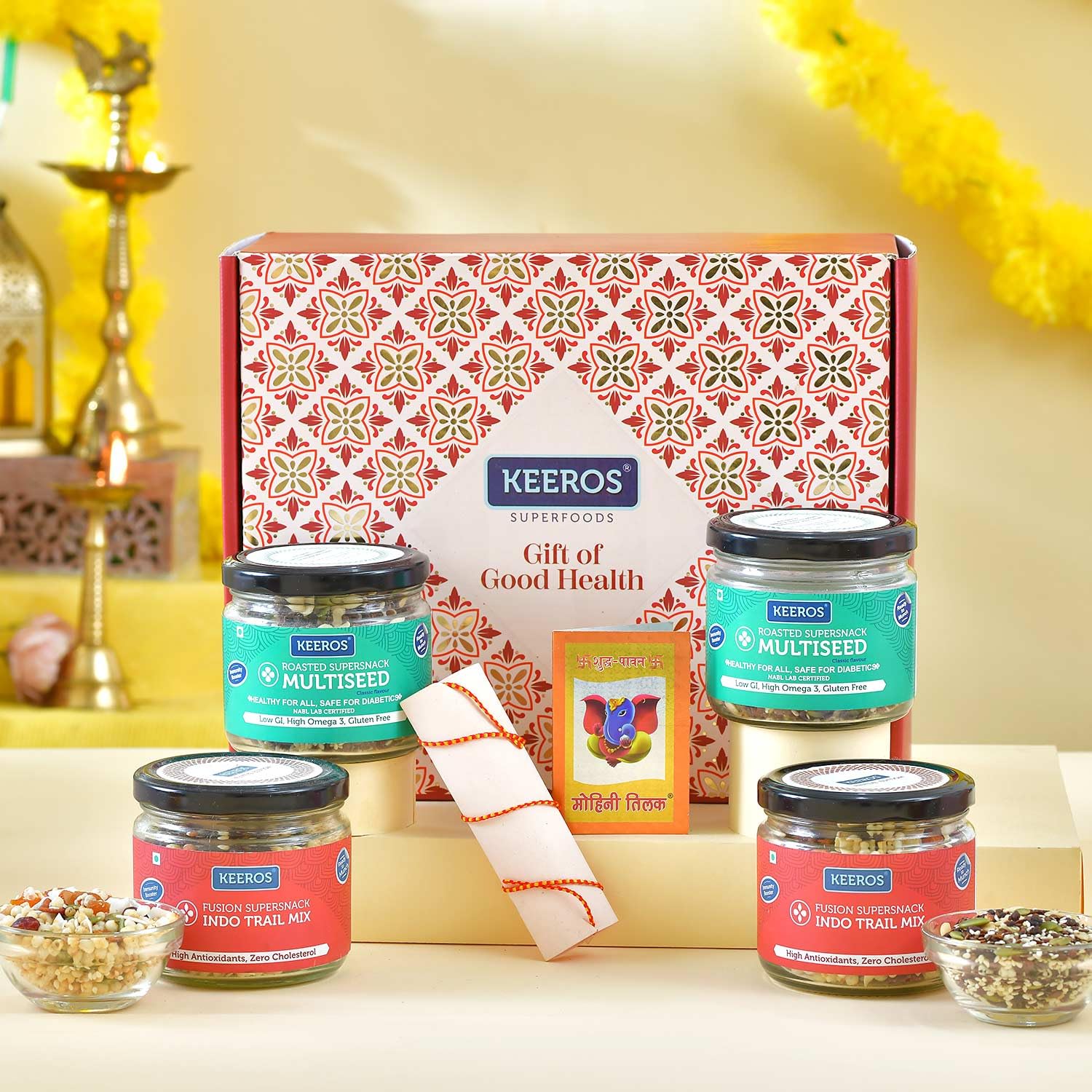 Keeros Healthy Bhai Dooj Sweets Gift Hamper for your Brother with Roli Moli Chandan Tikka Chawal Mishri |Combo of 2 varieties of Tasty & Nutritious Sweet Snacks (Dry Fruits mixed) in Glass Jars packed in a Premium Bhai Dooj Gift Hamper for your Brother