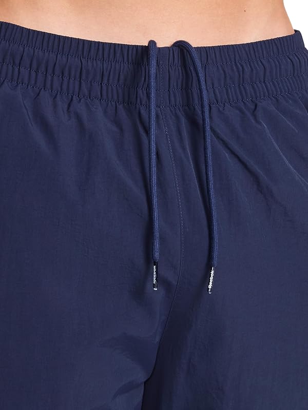 Reebok Men’s Track Pant, Standard Fit, 31” Inseam, Lightweight Nylon Fabric, Vector Navy, Medium by Reebok - Used condition - Image 4