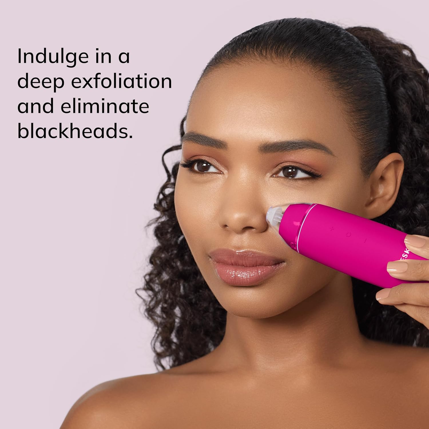 Woman using GESKE SmartAppGuided MicroDermabrasion Blackhead Remover on her nose