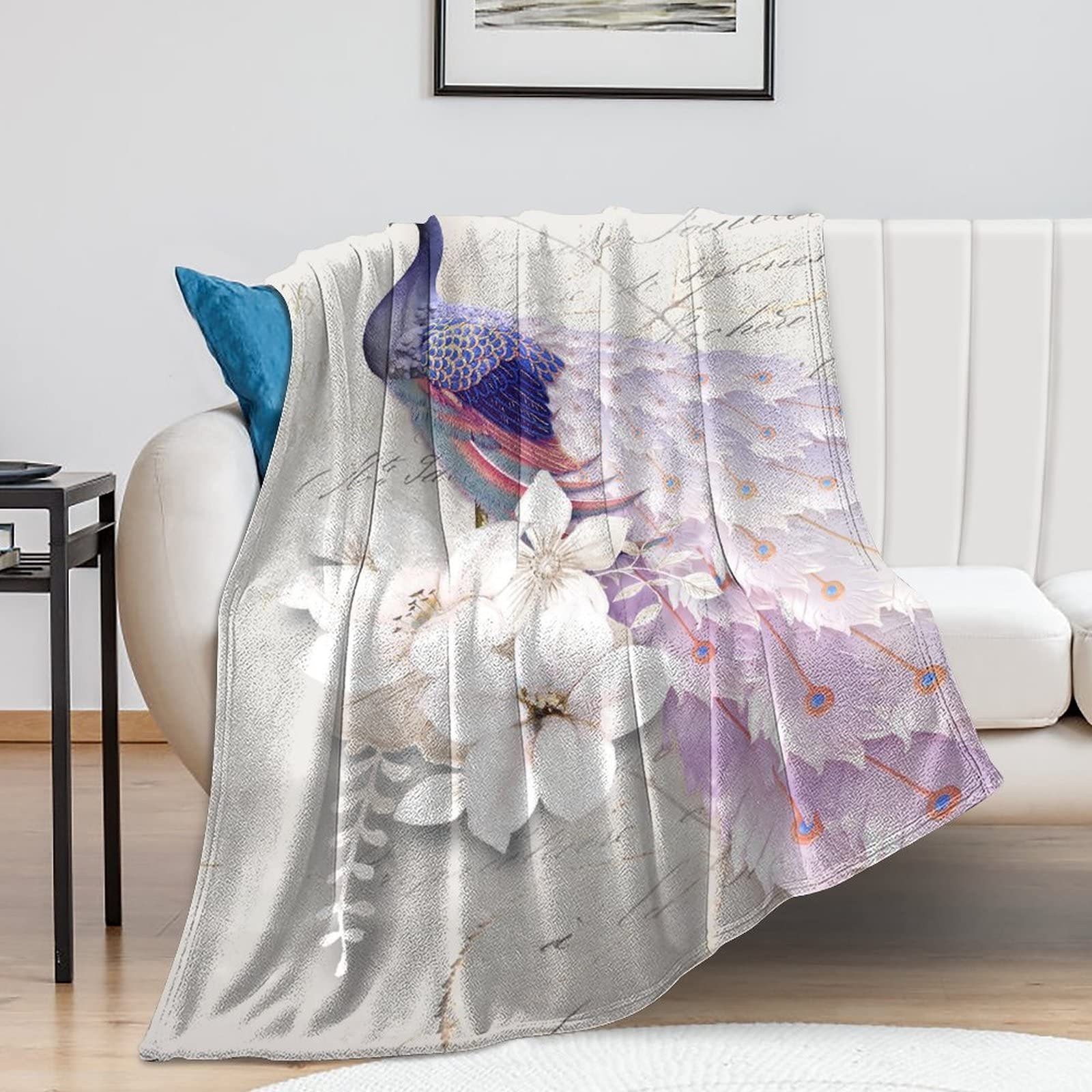 Couverture en flanelle motif paon un cocon de douceur pour envelopper toute la famille