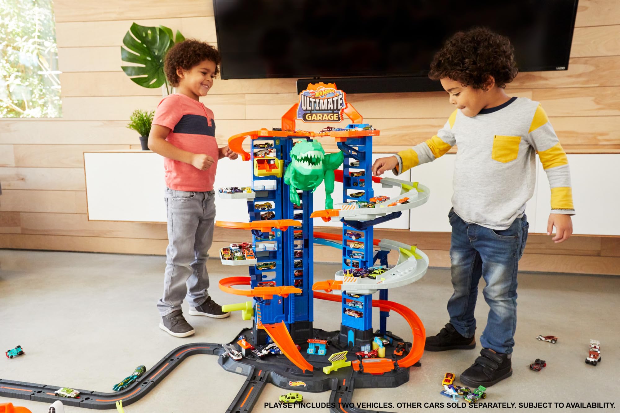 Hot Wheels City Robo T-Rex Ultimate Garage Modalità multigiocatore a più livelli per riporre auto in scala 100 plus 1 64, idea regalo per bambini dai 5 anni in su, GJL14