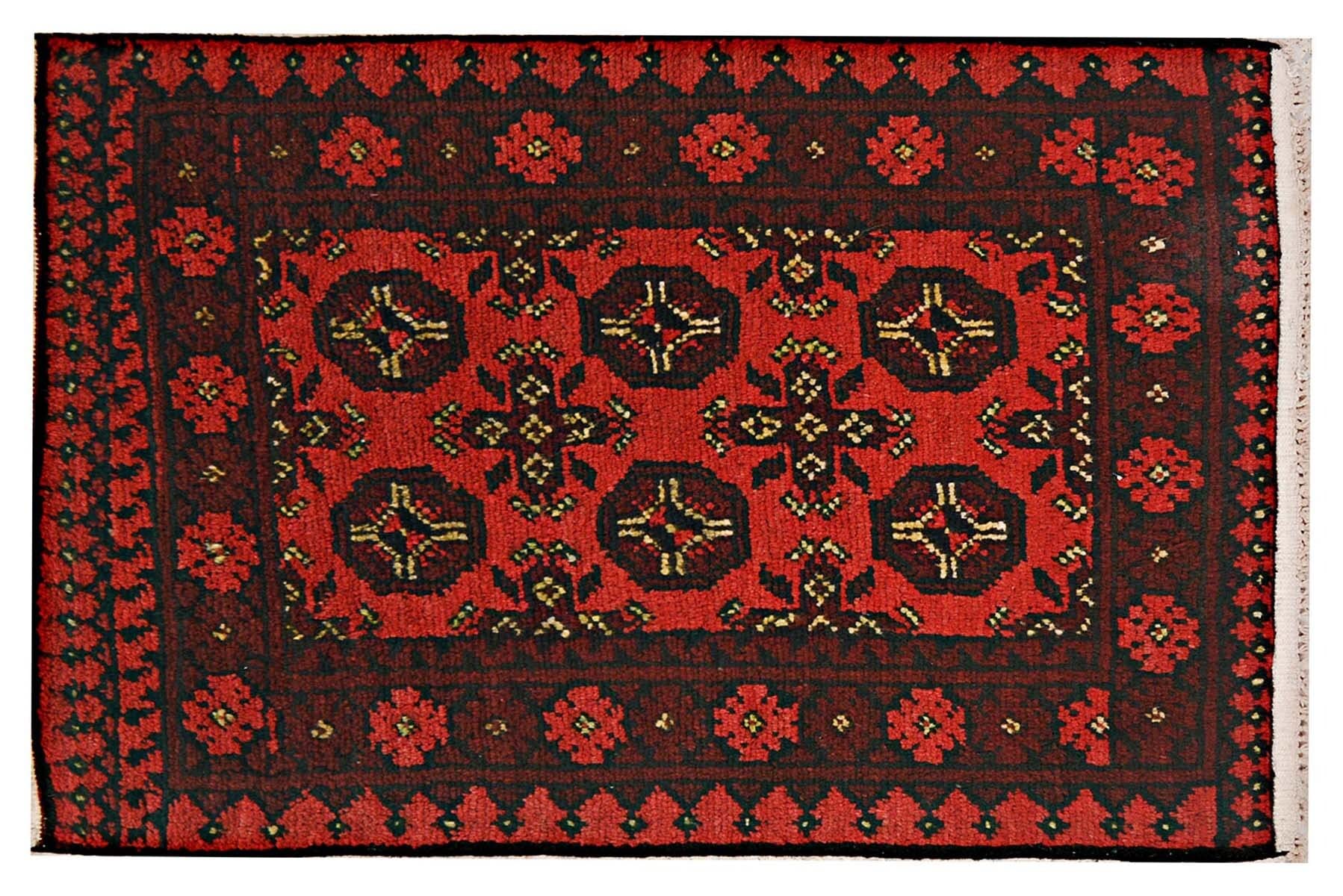 Tapis afghan 80x120 rouge pour habiller un petit espace