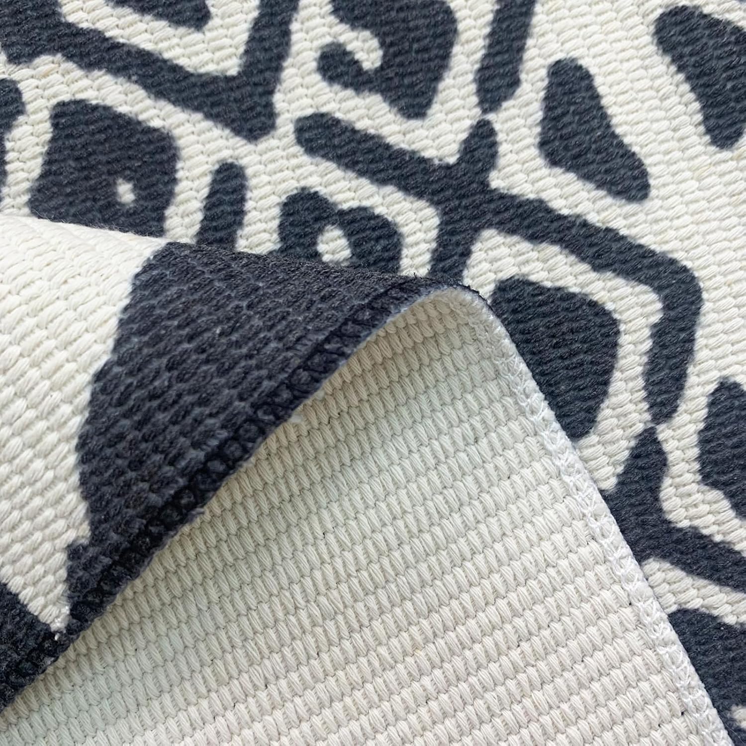 USTIDE Grand tapis bohème en coton tissé à la main avec pompons - Motif géométrique tribal - Pour salon, chambre à coucher, buanderie, cour - Noir et crème - 160 x 230 cm