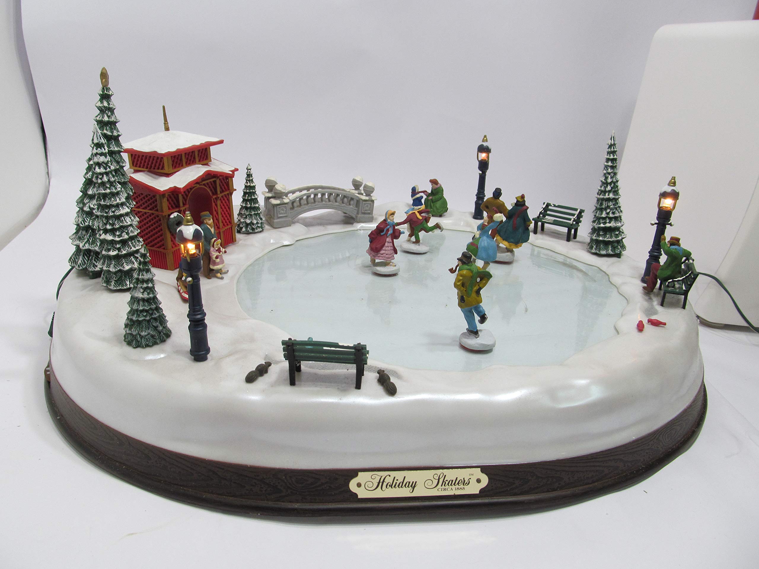 Mr. Christmas Holiday Skaters Ice Skating Rink : Amazon.in: Home