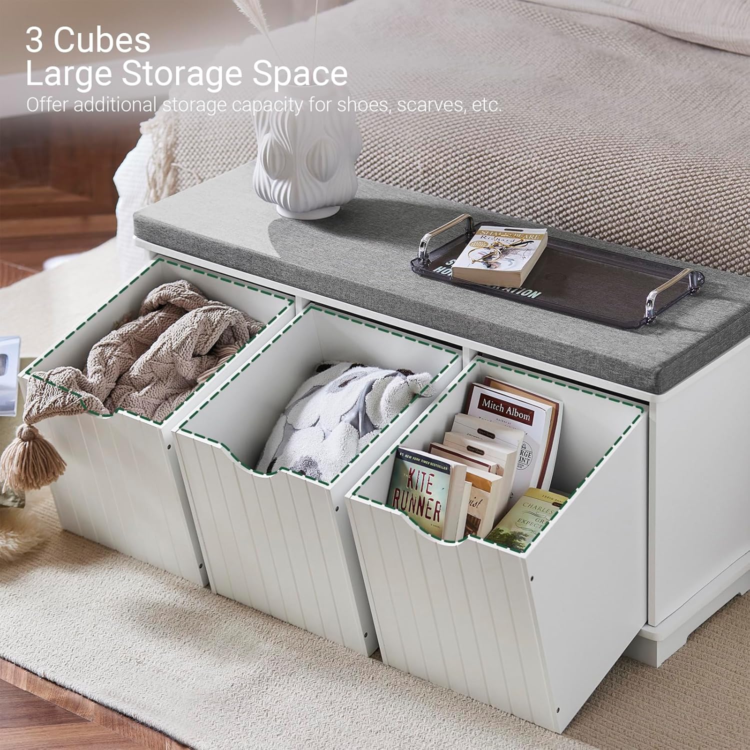Close-up of the Haotian FSR30-W storage bench showing the three pull-out drawers filled with various items like clothes and books