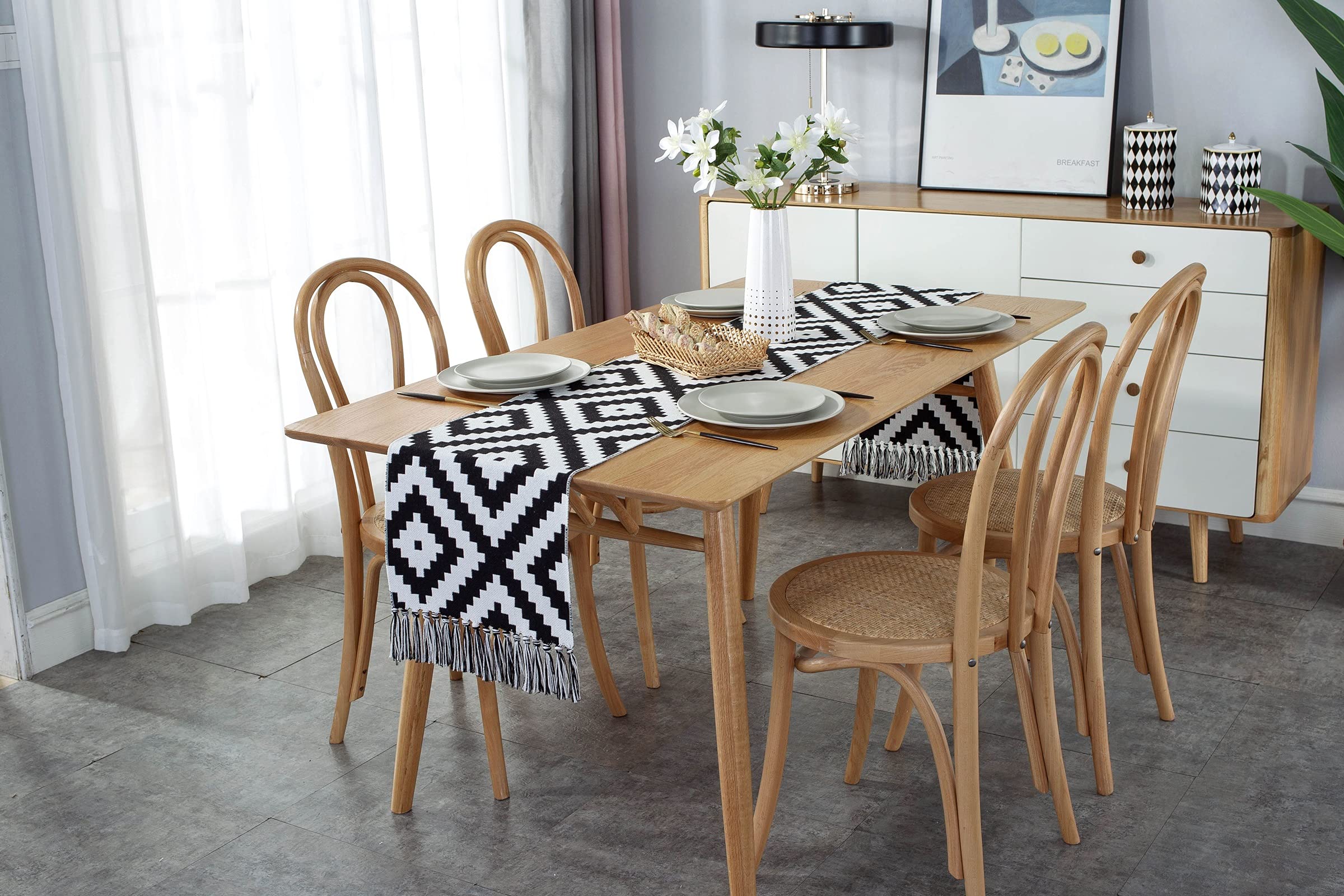 Katoenen linnen zwart wit geometrisch puzzelpatroon met kwastjes tafel