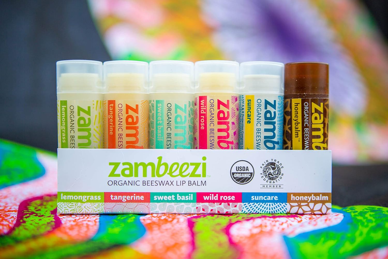 ZAMBEEZI Fair Trade, Organic Beeswax Lip Balm - Variety 6 Pack (Lemongrass, Tangerine, Wild Rose, Sweet Basil, Suncare and Honeybalm) - Ethically Sourced image 2