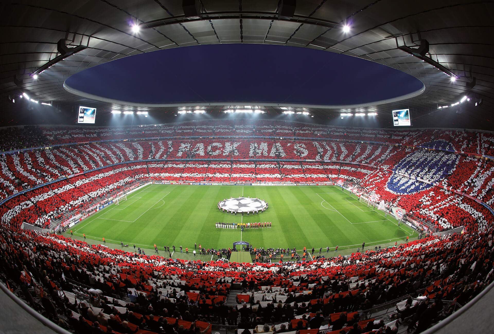 A.S. Création Fototapete - Tapete Stadion FC Bayern in Rot, Weiß und Grün - Wandtapete für verschiedene Räume - Vliestapete Wandbild XXL 384 x 260 cm