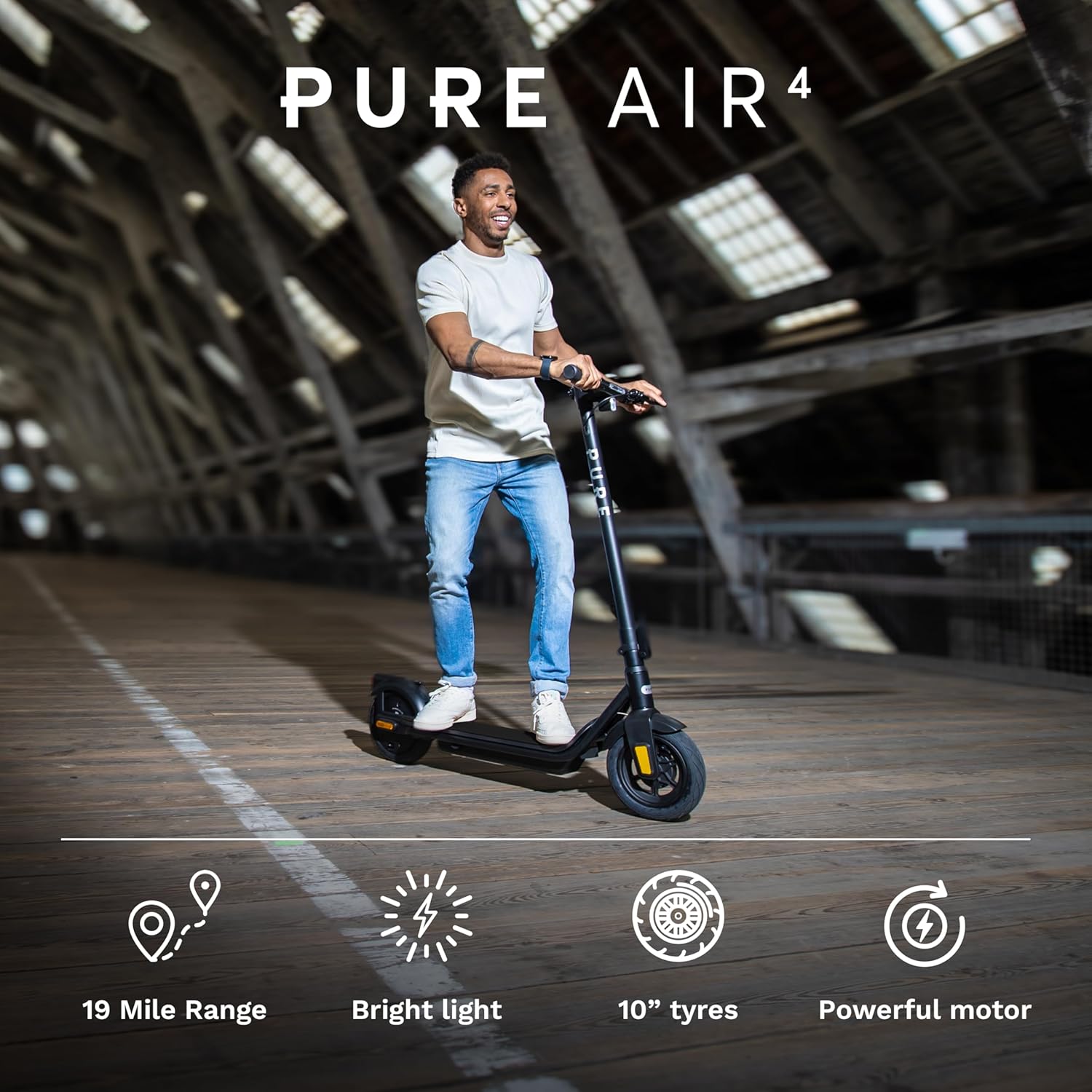 Person riding Pure Air Electric Scooter, highlighting range, light, tires, and motor