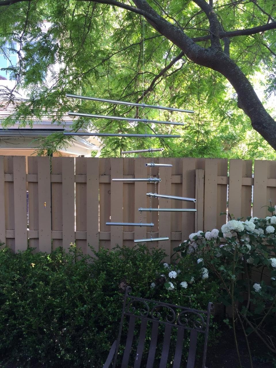 Compagnon Doux by Azure // Large metal mobile art that spins peacefully in the wind. Kinetic sculpture for your garden or home.