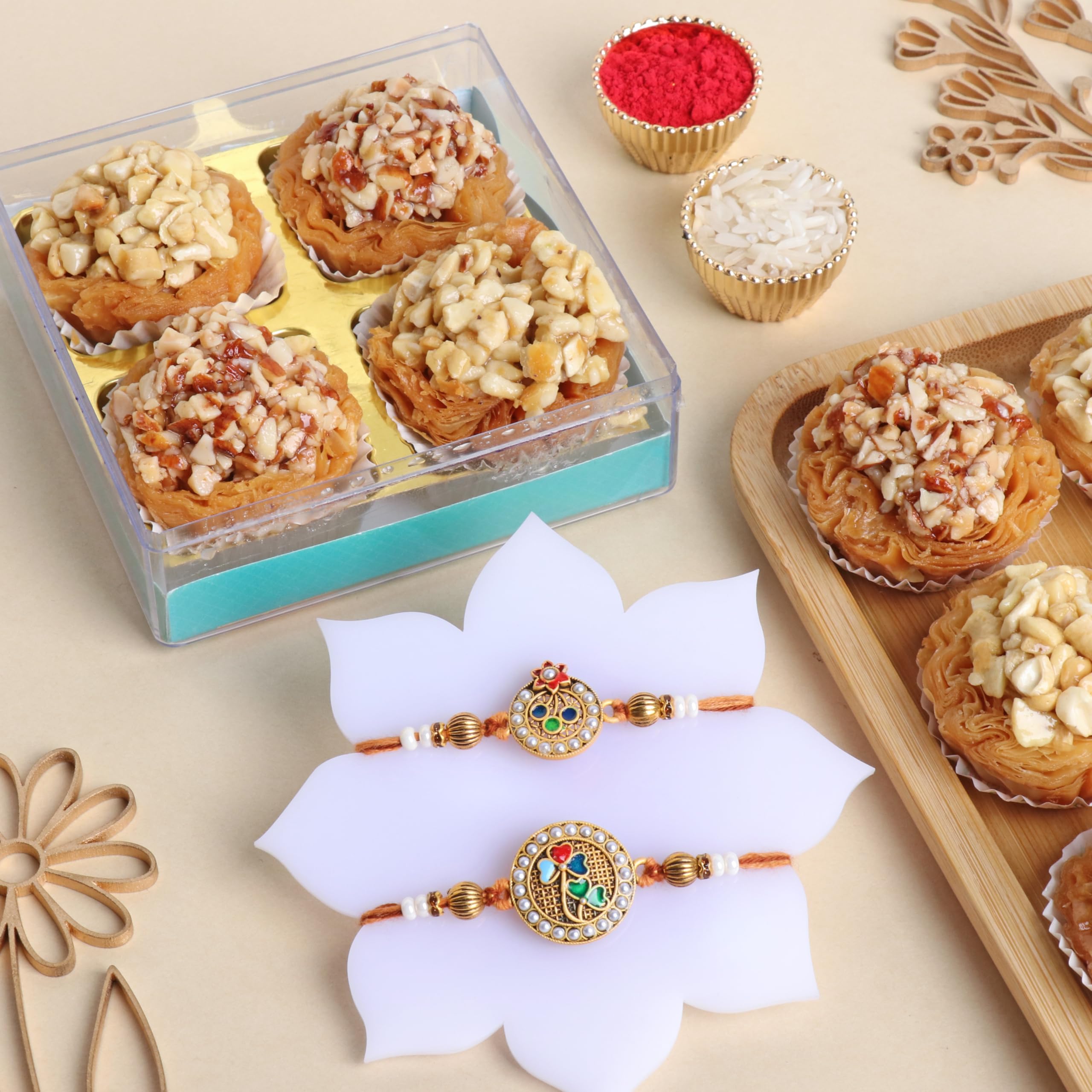 FlowerAura Raksha Bandhan Celebrations Meenakari Pearl Studded Set Of 2 Rakhis With Pack Of 4 Baklava Tart Sweet - Rakhi for Brother, Bhai, Cousins & Raksha Bandhan Gift (Same Day Delivery) (B0D9BSN39G) Amazon Price History, Amazon Price Tracker