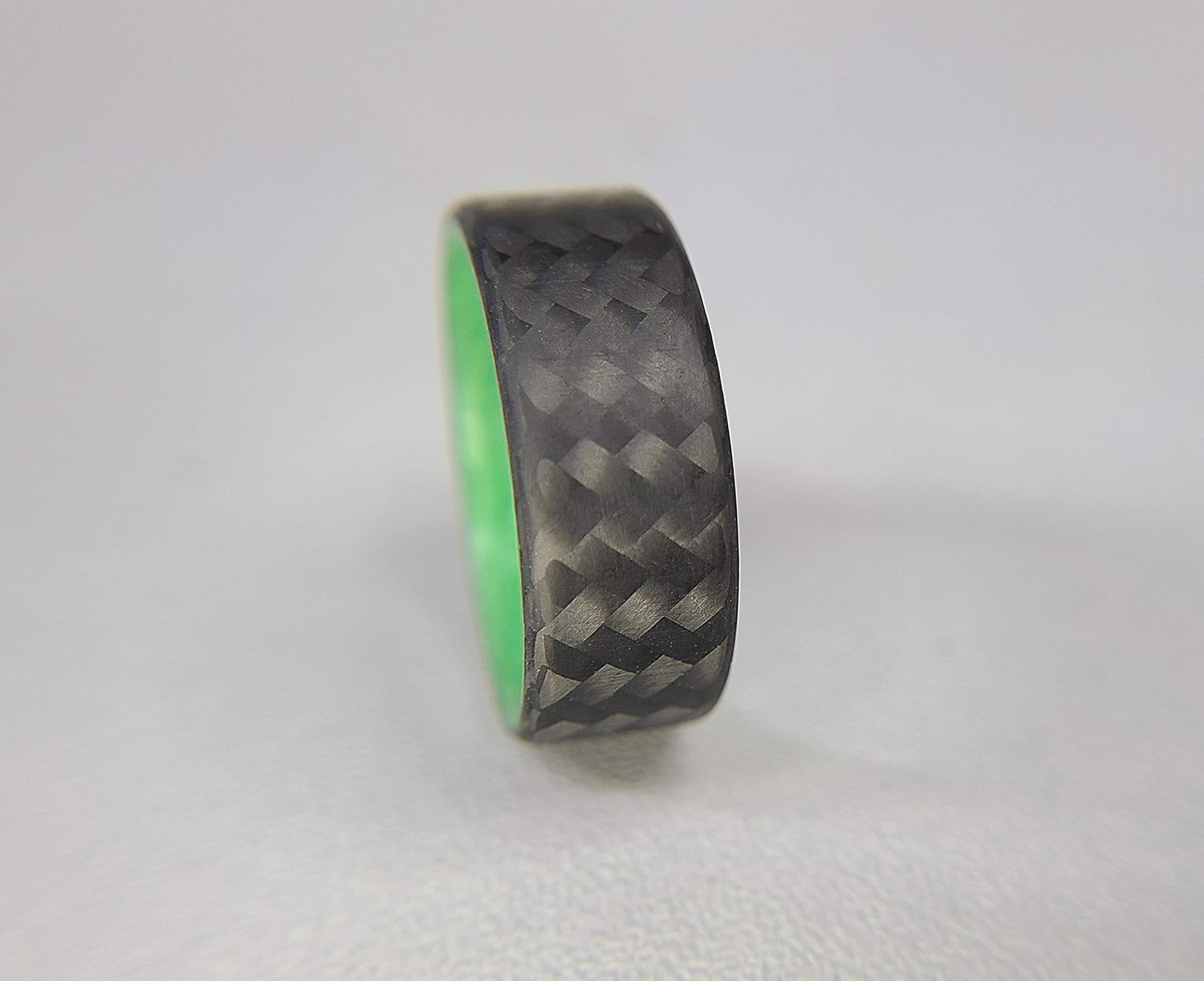 Carbon Fiber Twill Ring with Green Glow Interior, Matte Finish, Glow-in-the-Dark, Durable, Waterproof, Sizes 4-16, Custom Band Widths, Made in USA