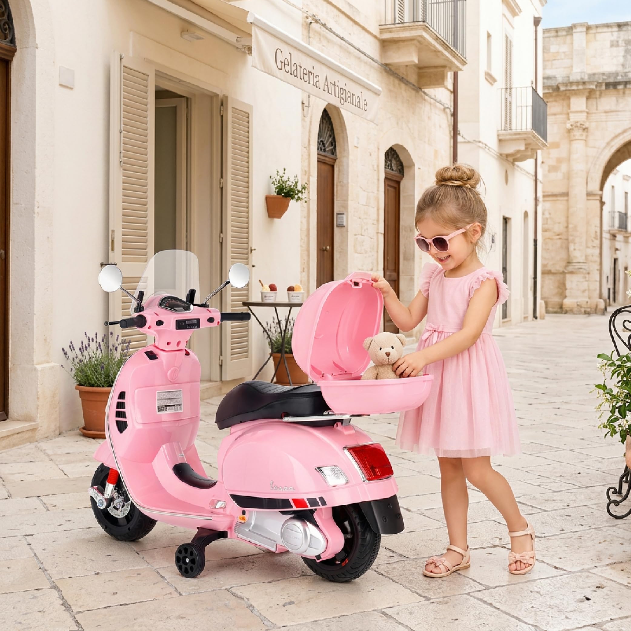 Moto Eléctrica Vespa para Niños con Ruedas y Asiento de plástico, Maletero, Reproductor MP3, Toma AUX USD MicroSD (Rosa Claro)