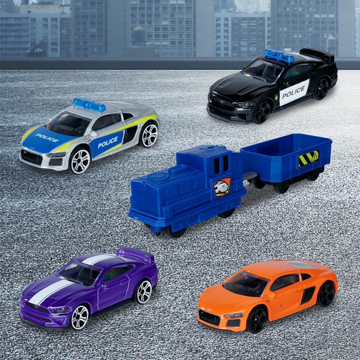 Included Majorette vehicles: four die-cast cars and one blue train with a trailer.