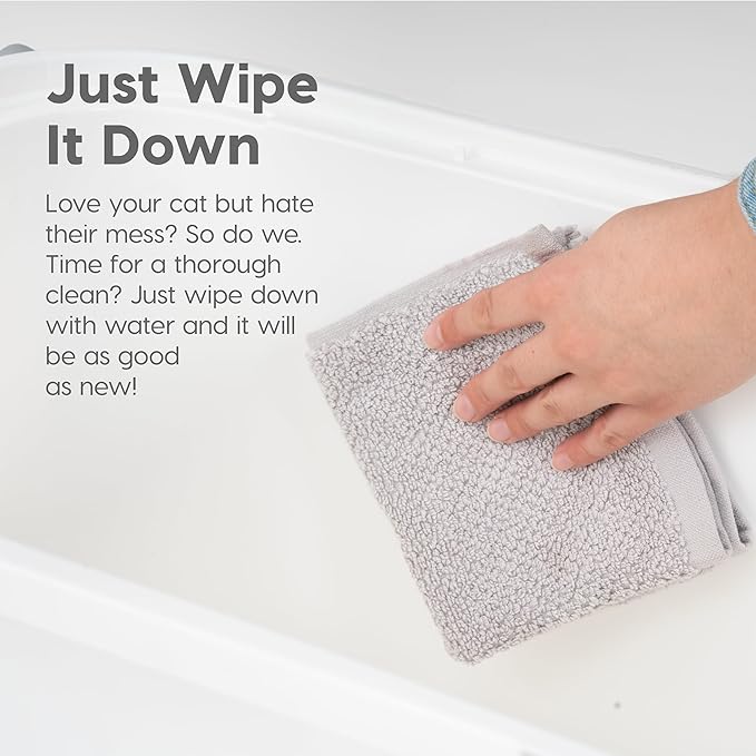 The litter box features a unique lid that helps to catch stray litter particles when your cat exits the box, minimizing mess and keeping your floors cleaner. The walls of the litter box are designed to provide cats with added privacy and security while they use the box. The white and gray color scheme of the litter box makes it an attractive addition to any home, blending in seamlessly with your existing decor.