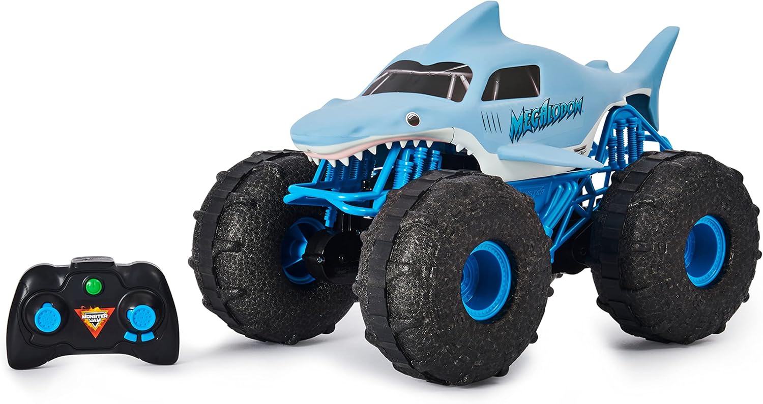 Monster Jam Megalodon Storm RC Truck next to its remote control.