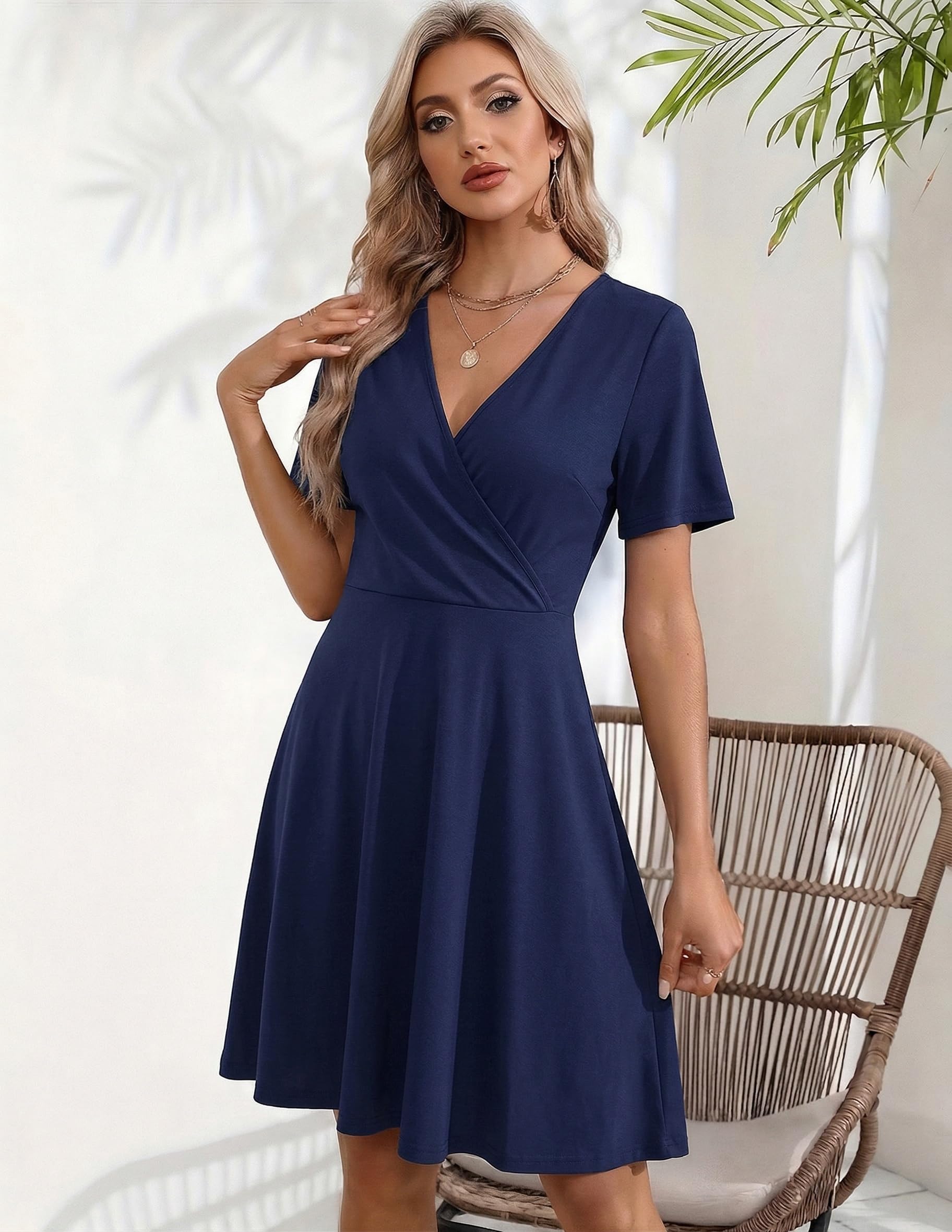 Zeagoo Vestido de verano para mujer, cuello de pico, manga corta, vestido de playa, estampado floral, vestido con bolsillos, volantes, mangas envolventes, S-XXL