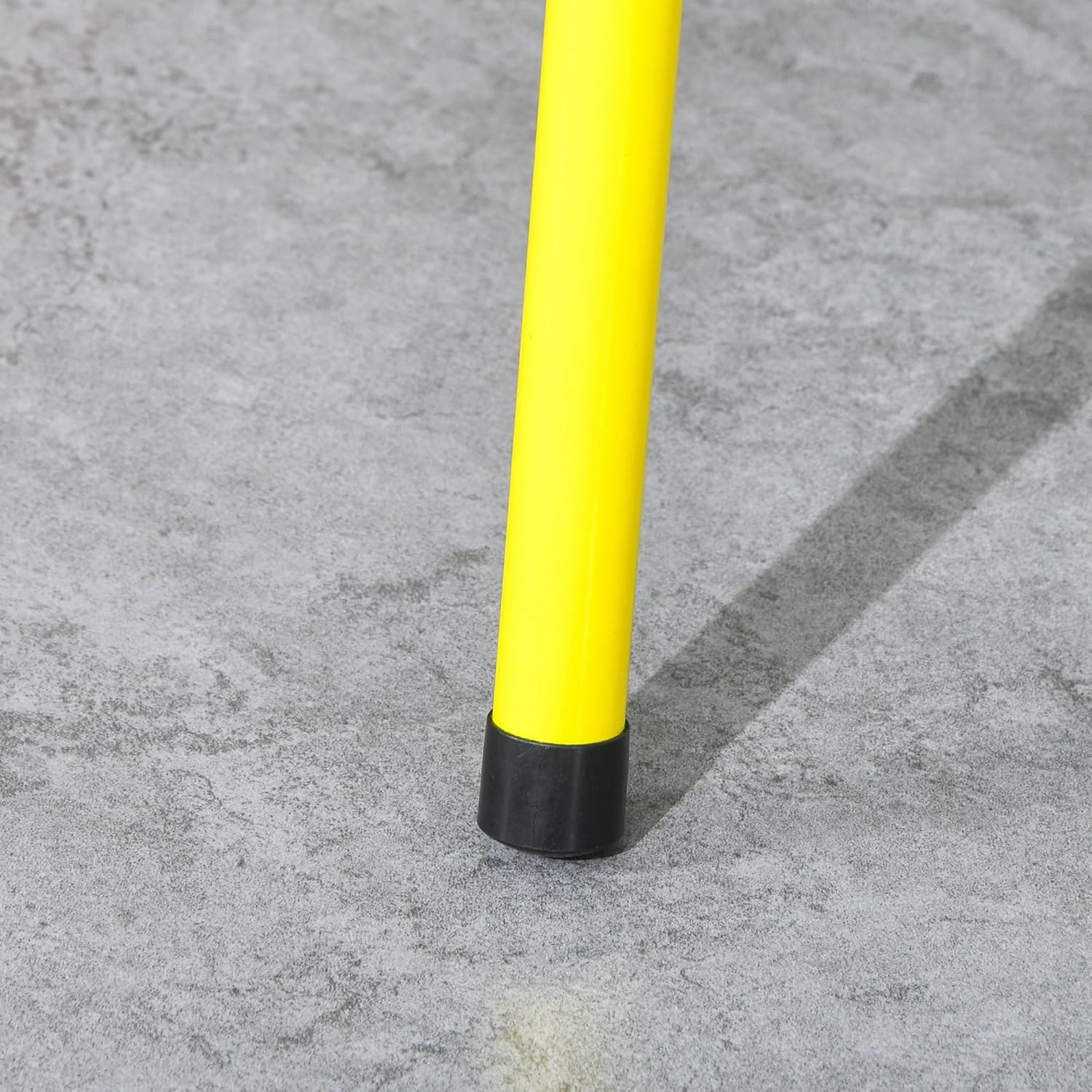 Close-up of the yellow leg with a black foot cap.