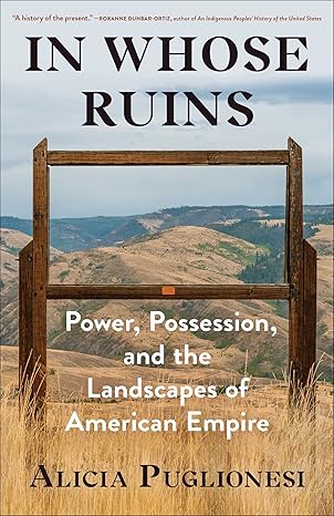 Book cover with an photo of a wooden structure similar in tall grass in the foreground and foothills in the background.
