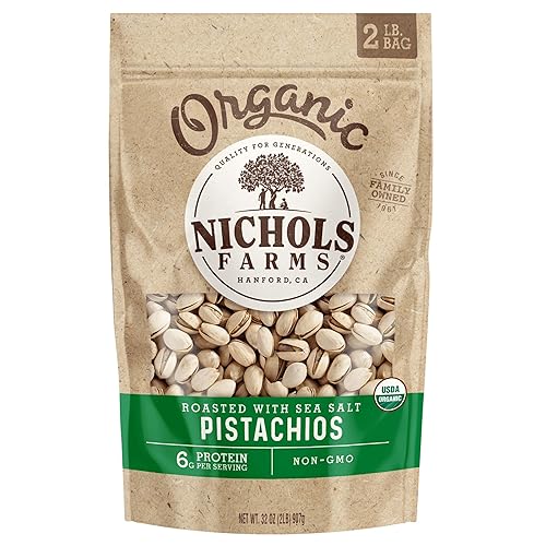 Vista 14 de Nichols Farms Pistachos cultivados en California, InShell, paquetes de aperitivos ricos en nutrientes, ajo tostado, 2 libras