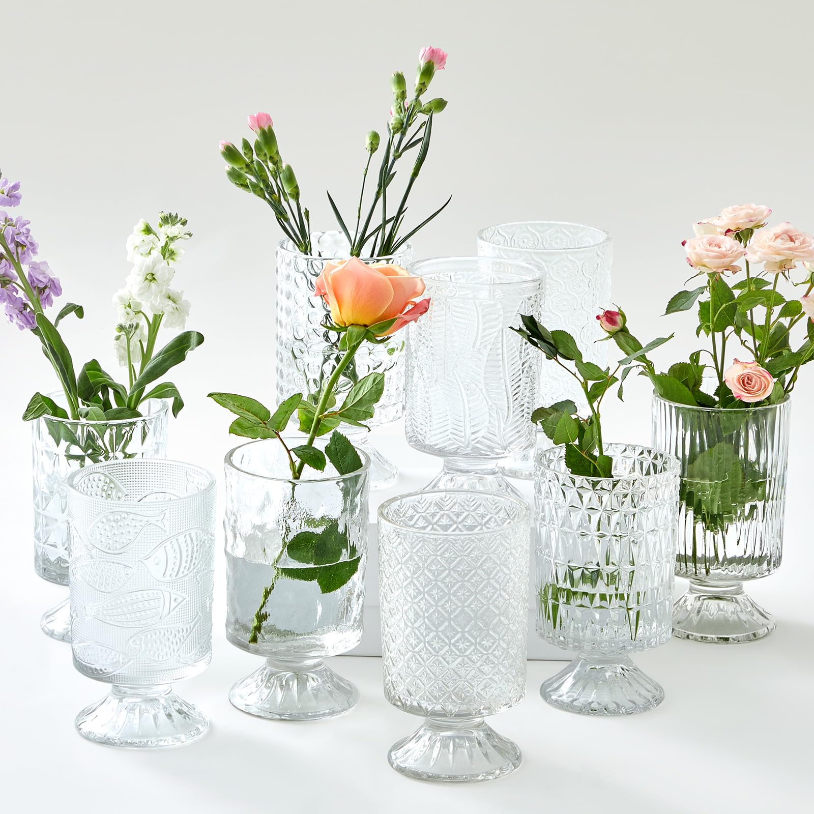 Photo 1 of Ninehaoou 9 Pcs (H: 7" W: 4") Embossed Flower Vase Pedestal Glass Vase Big Base Thickened Crystal Vintage Vases for Wedding Party Home Decor Table Centerpiece House Warming Gifts (Clear,Stylish)