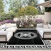 OutdoorLines Outdoor Reversible Rugs for Patio 6x9 ft - Plastic Area Rug, Stain & UV Resistant Portable RV Carpet, Plastic Straw Mats for Porch, Pool Deck and Camping QuatrefoilBlack & White