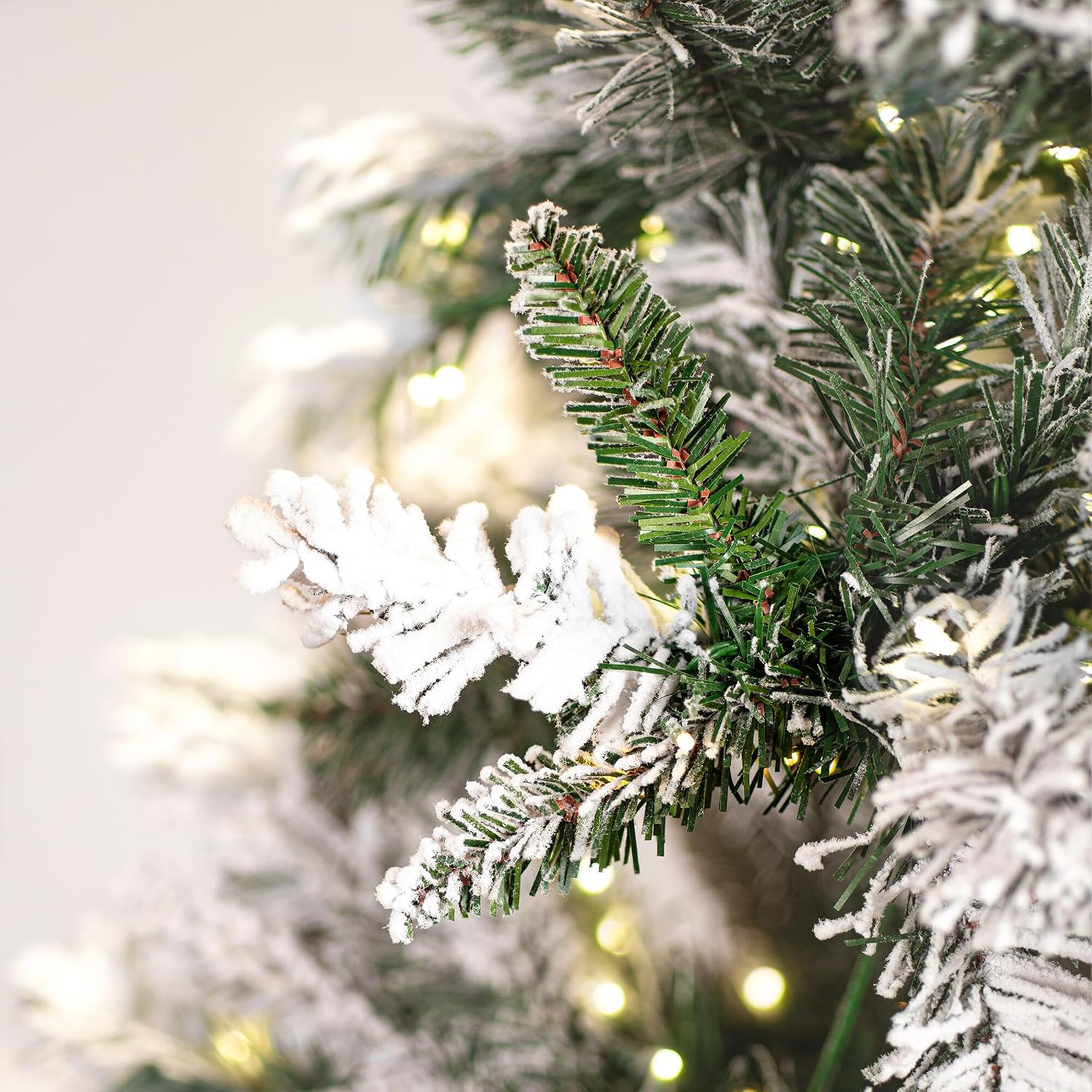 Vickerman 10' x 55" Frosted Glacier Pine Artificial Pre-Lit Christmas Tree with Folding Metal Tree Stand
