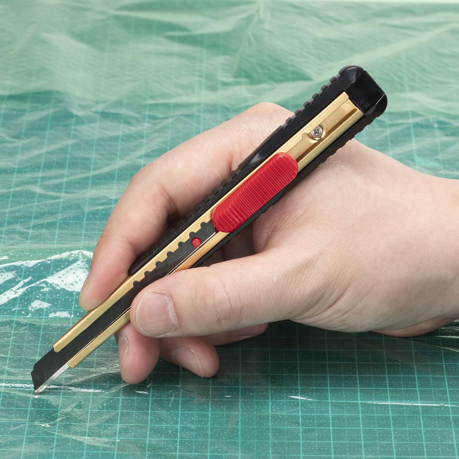 KAI 9mm Snap Blade Utility Knife (S-001), Multi-Purpose Retractable Black Carbon Steel Blade, Ultra Sharp, Professional Grade for Use with Wallpaper, Paper, Cardboard, Styrofoam, DIY - Made in JAPAN