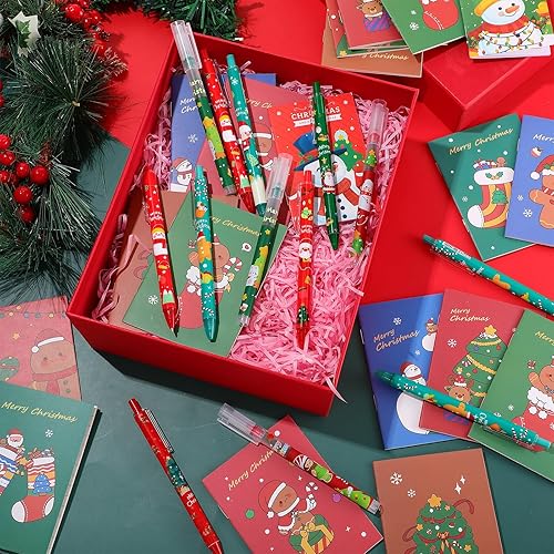 Miniatura 5 de Pasimy Juego de 140 bolígrafos de tinta de gel de Navidad y mini cuaderno de Navidad, bonitos blocs de notas de Navidad pequeños a granel de 0.020