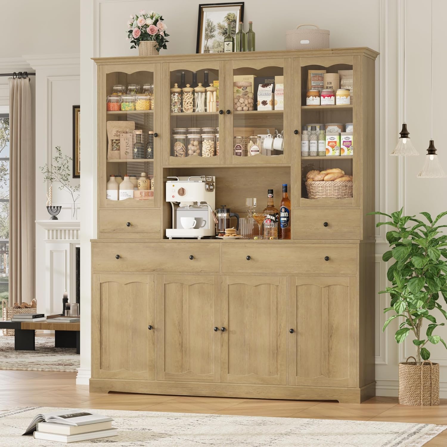 Detailed view of the cabinet's doors, showcasing the petal-shaped carved design and classic black handles.